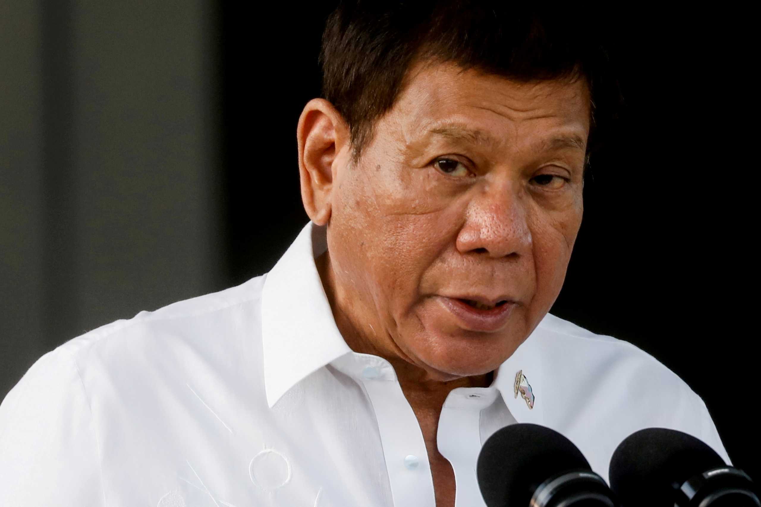 FILE PHOTO: Philippine President Rodrigo Duterte speaks at Villamor Air Base in Pasay, Metro Manila, Philippines, February 28, 2021. REUTERS