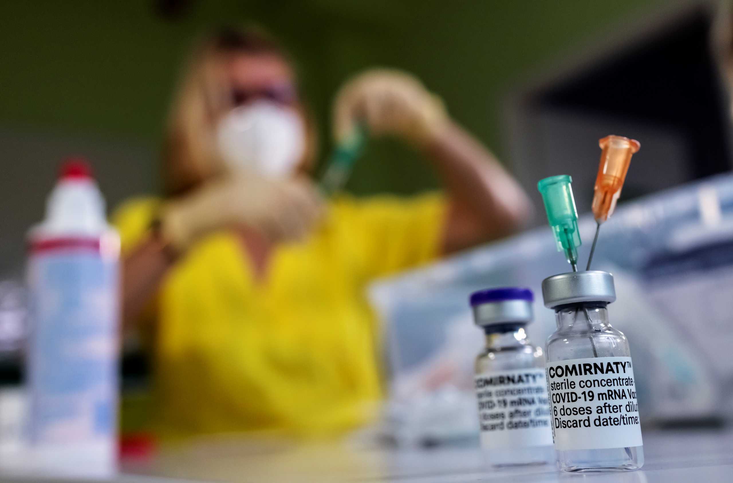 Vials of the "Comirnaty" Pfizer BioNTech coronavirus disease (COVID-19) vaccine are pictured in a doctor's office in Berlin, Germany, November 2, 2021. REUTERS
