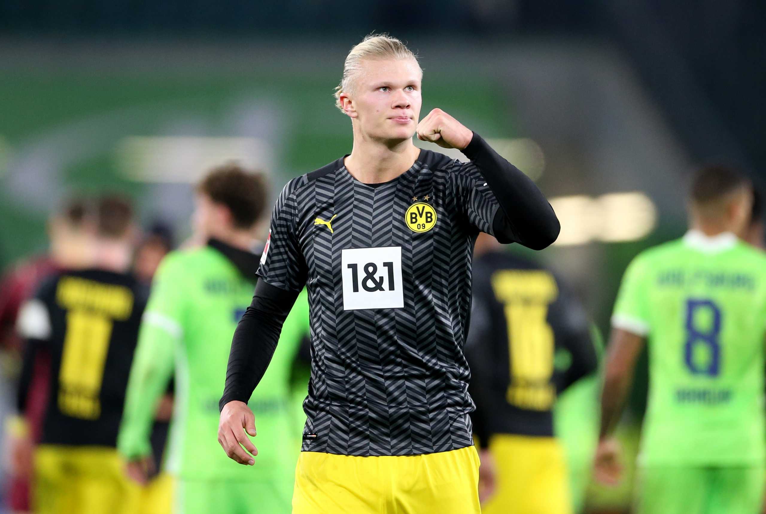 Soccer Football - Bundesliga - VfL Wolfsburg v Borussia Dortmund - Volkswagen Arena, Wolfsburg, Germany - November 27, 2021 Borussia Dortmund's Erling Braut Haaland celebrates after the match REUTERS