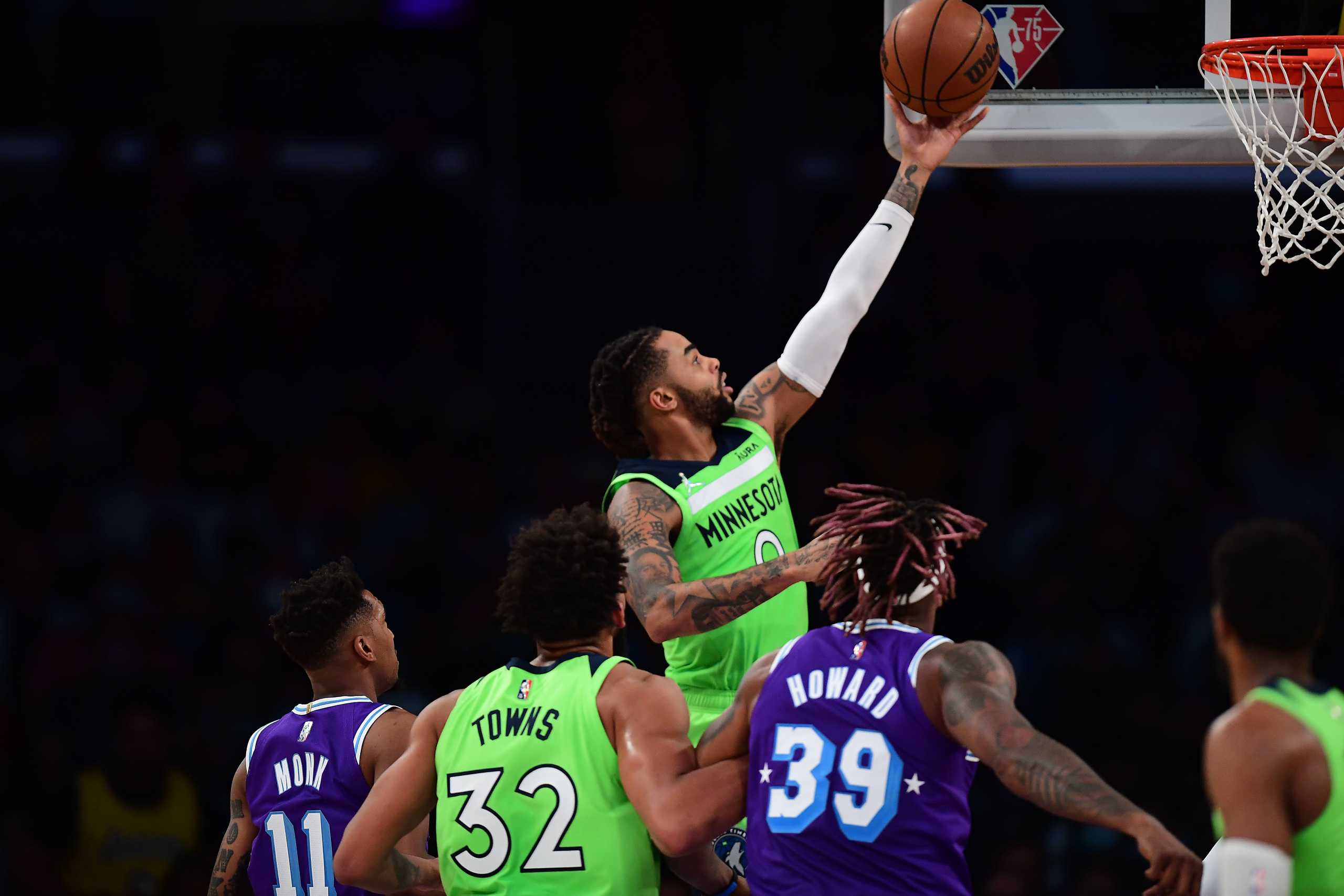 Nov 12, 2021; Los Angeles, California, USA; Minnesota Timberwolves guard D'Angelo Russell (0) moves to the basket against the Los Angeles Lakers during the second half at Staples Center. Mandatory Credit: Gary A. Vasquez-USA TODAY Sports