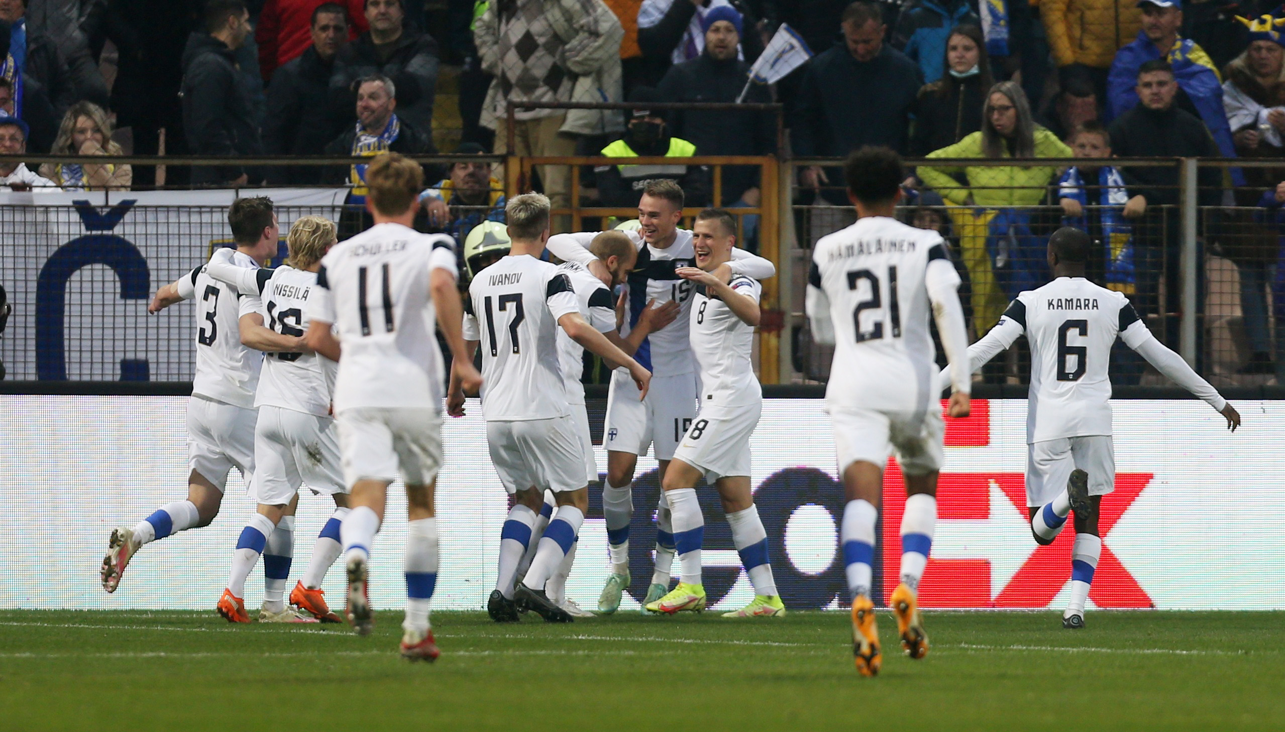 Soccer Football - World Cup - UEFA Qualifiers - Group D - Bosnia and Herzegovina v Finland - Bilino Polje Stadium, Zenica, Bosnia and Herzegovina - November 13, 2021 Finland's Robin Lod celebrates scoring their second goal with teammates REUTERS