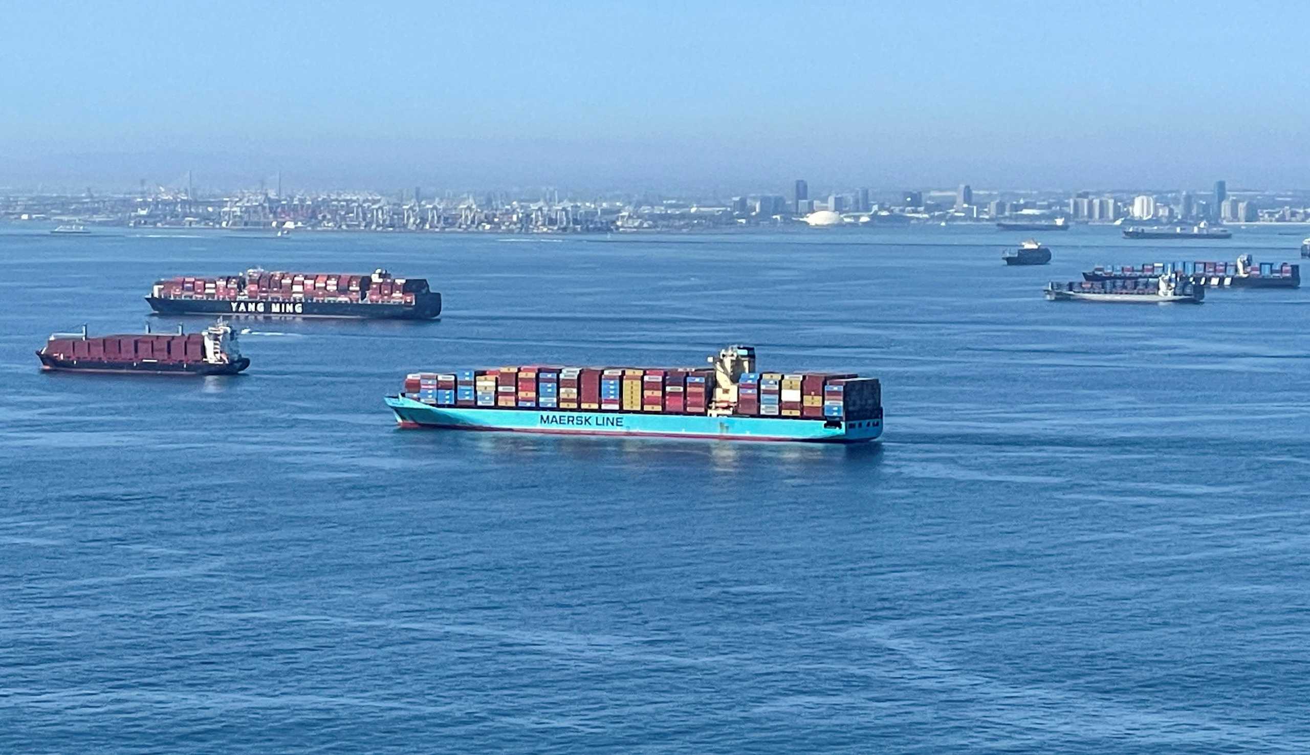 FILE PHOTO: Container ships wait off the coast of the congested Ports of Los Angeles and Long Beach in Long Beach, California, U.S., October 1, 2021.  REUTERS