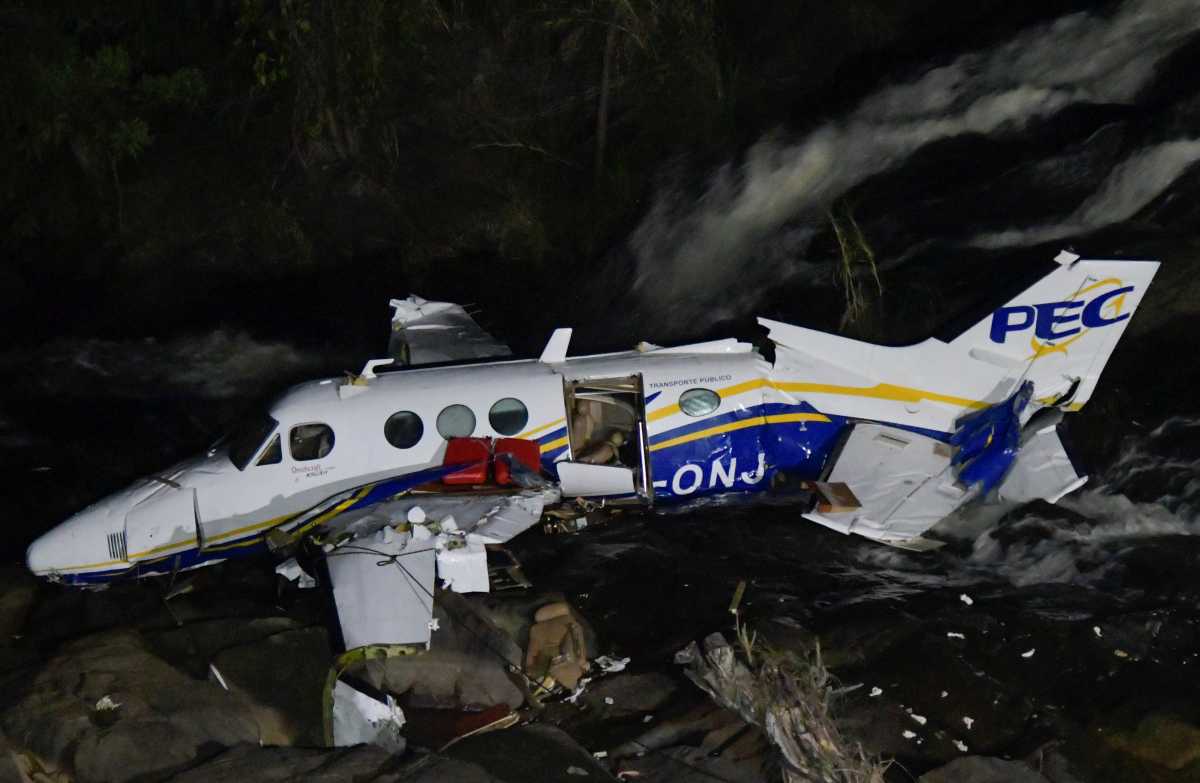 The wreckage of a small airplane that crashed with Brazilian country singer Marilia Mendonca, 26, on board, is seen near a waterfall area in Piedade de Caratinga, state of Minas Gerais, Brazil, November 5, 2021. REUTERS