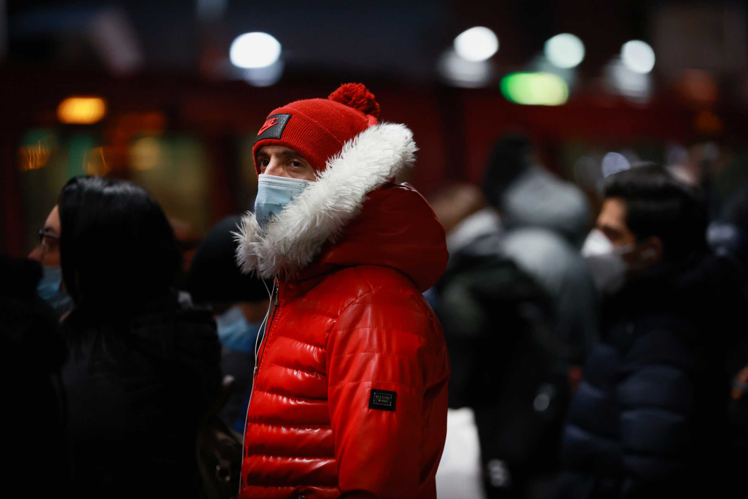 People wear face masks on the London underground, as the spread of the coronavirus disease (COVID-19) continues in London, Britain, November 30, 2021. REUTERS