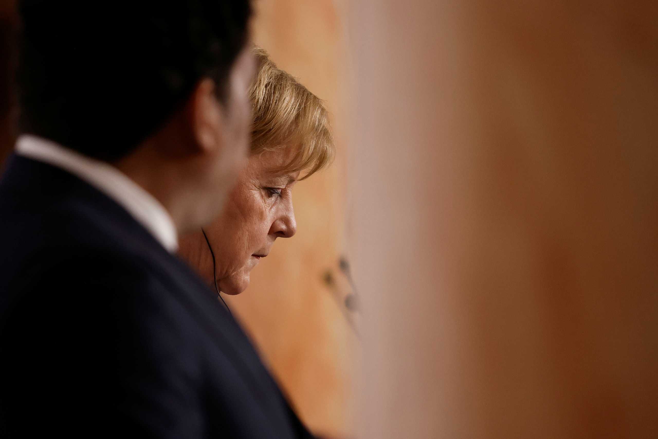 German Chancellor Angela Merkel participates in the press conference at the end of the International Conference on Libya at La Maison de la Chimie in Paris, France, November 12, 2021. Yoan Valat