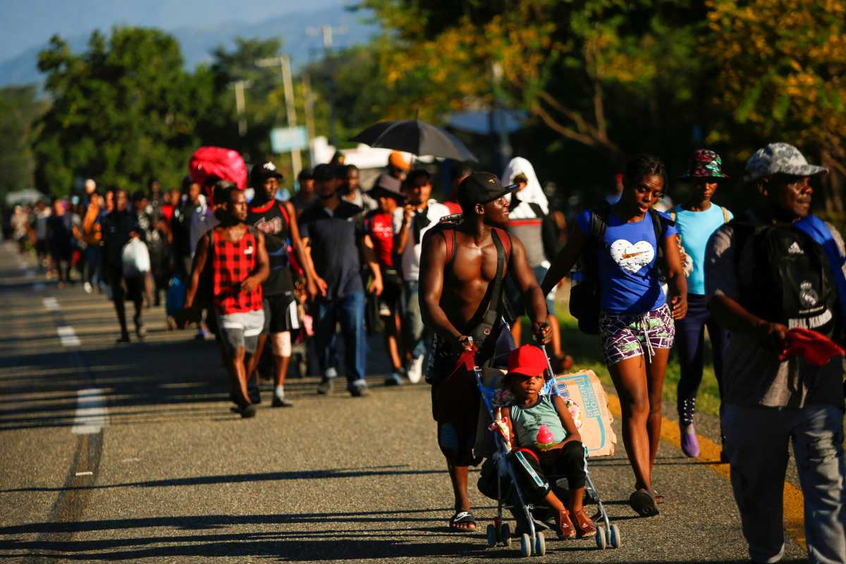 Migrants join a caravan heading to the U.S. border, near Villa Comaltitlan, Mexico, November 20, 2021. REUTERS