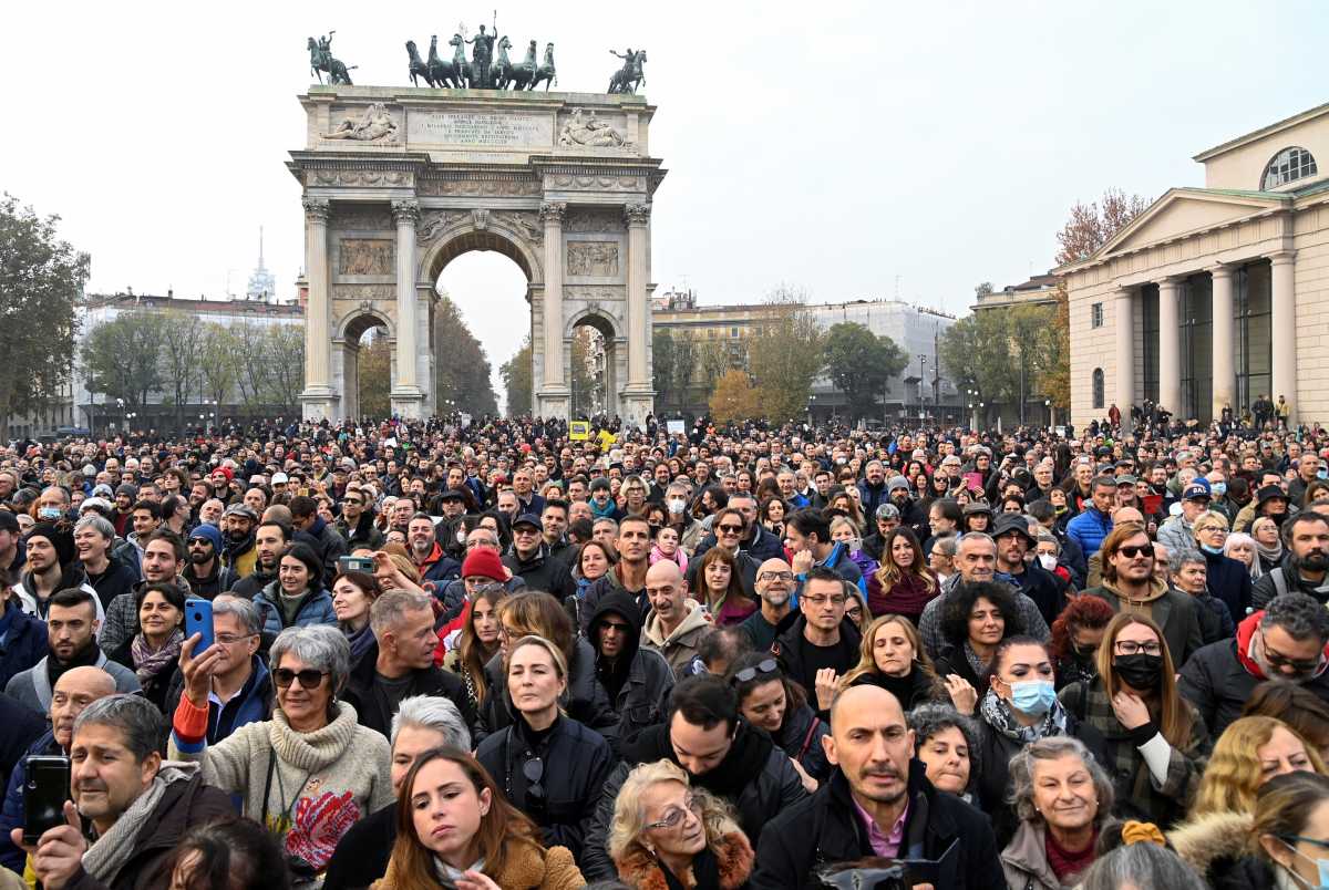 People gather at a demonstration against coronavirus disease (COVID-19) vaccinations, in Milan, Italy, November 13, 2021. REUTERS