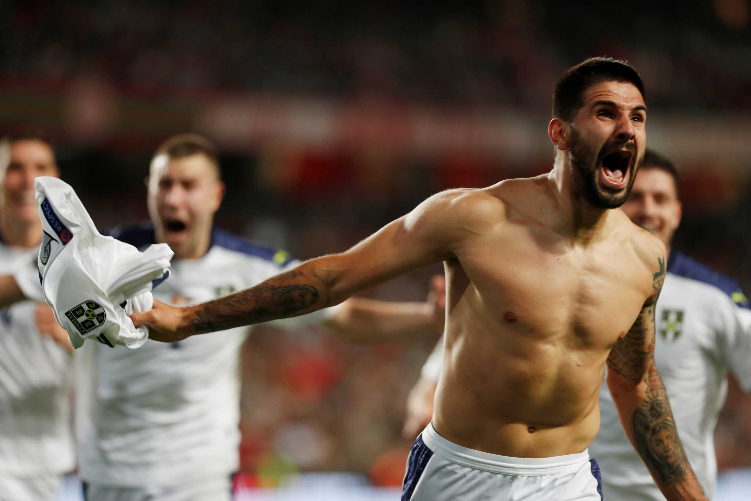 Soccer Football - World Cup - UEFA Qualifiers - Group A - Portugal v Serbia - Estadio da Luz, Lisbon, Portugal - November 14, 2021 Serbia's Aleksandar Mitrovic celebrates scoring their second goal REUTERS