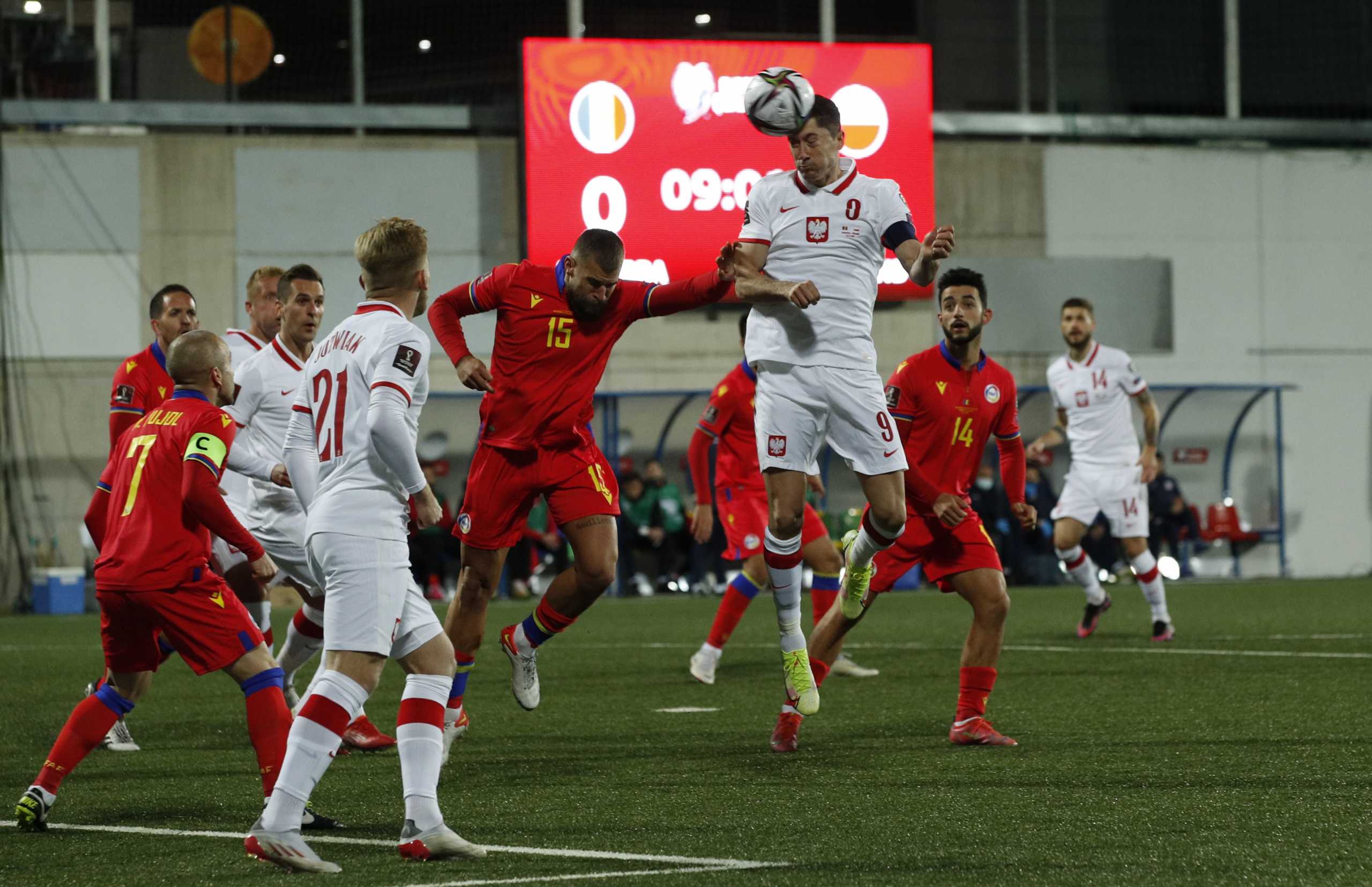 Soccer Football - World Cup - UEFA Qualifiers - Group I - Andorra v Poland - Estadi Nacional, Andorra la Vella, Andorra - November 12, 2021 Poland's Robert Lewandowski in action with Andorra's Moises San Nicolas REUTERS