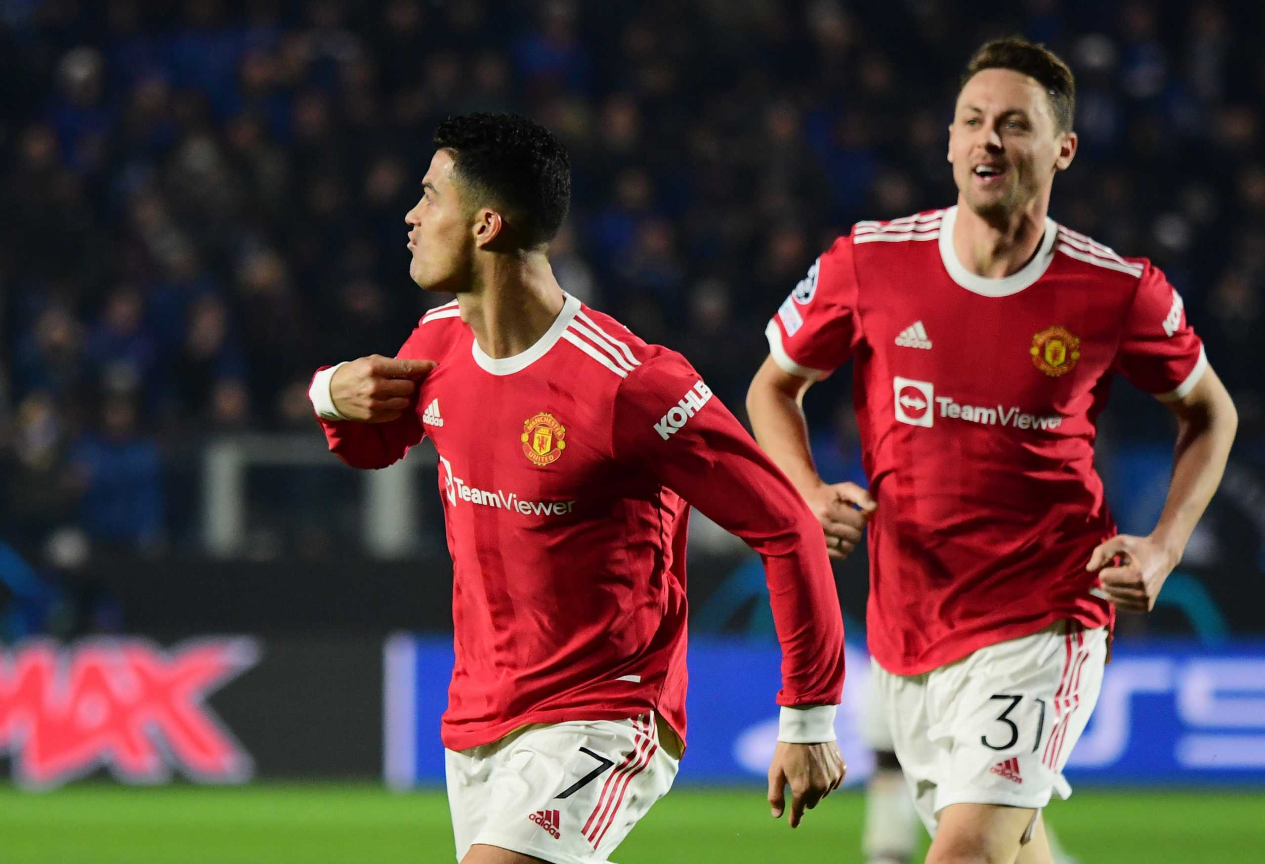 Soccer Football - Champions League - Group F - Atalanta v Manchester United - Stadio Atleti Azzurri, Bergamo, Italy - November 2, 2021 Manchester United's Cristiano Ronaldo celebrates scoring their second goal with Nemanja Matic REUTERS