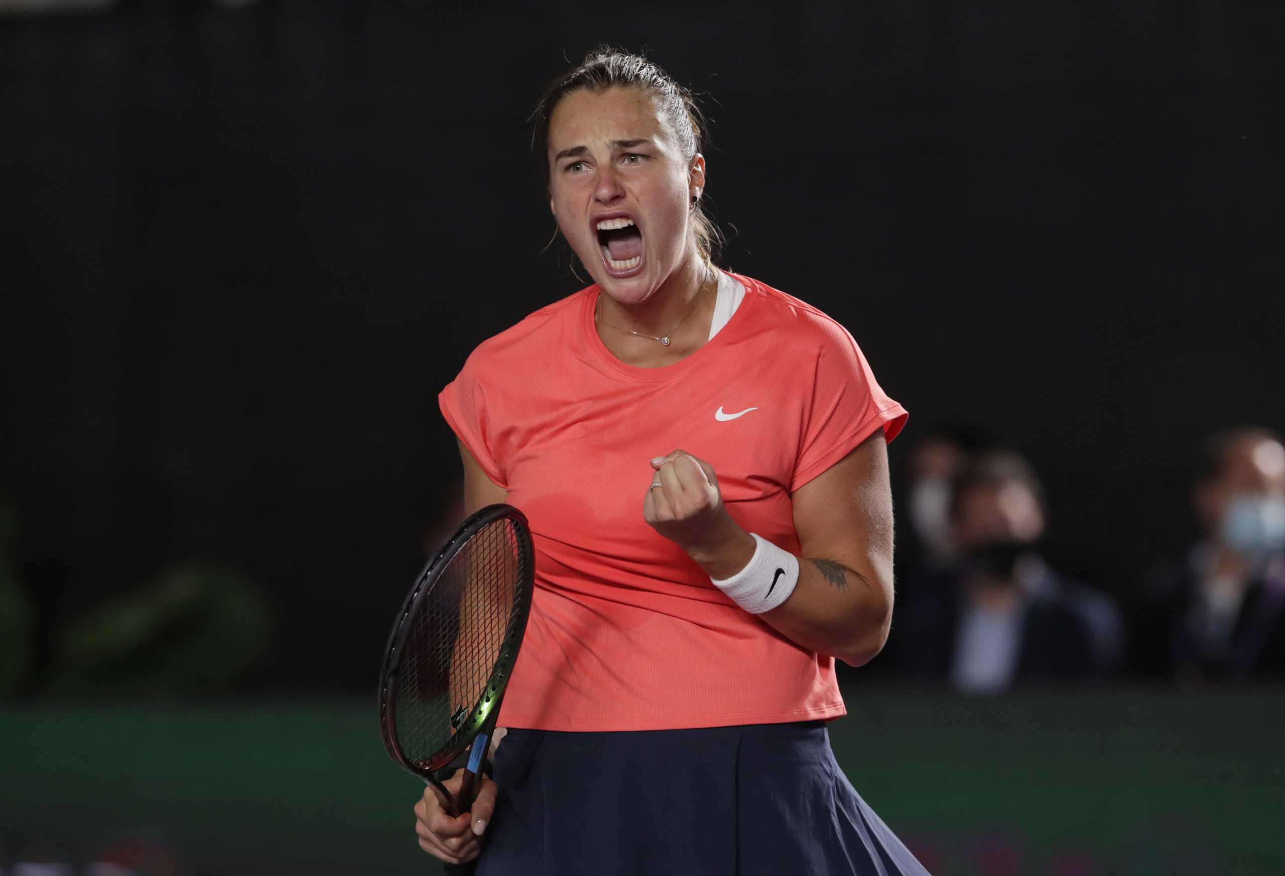 Tennis - WTA Tour Finals - Panamerican Tennis Center, Guadalajara, Mexico - November 13, 2021  Belarus' Aryna Sabalenka reacts during her group stage match against Poland's Iga Swiatek REUTERS