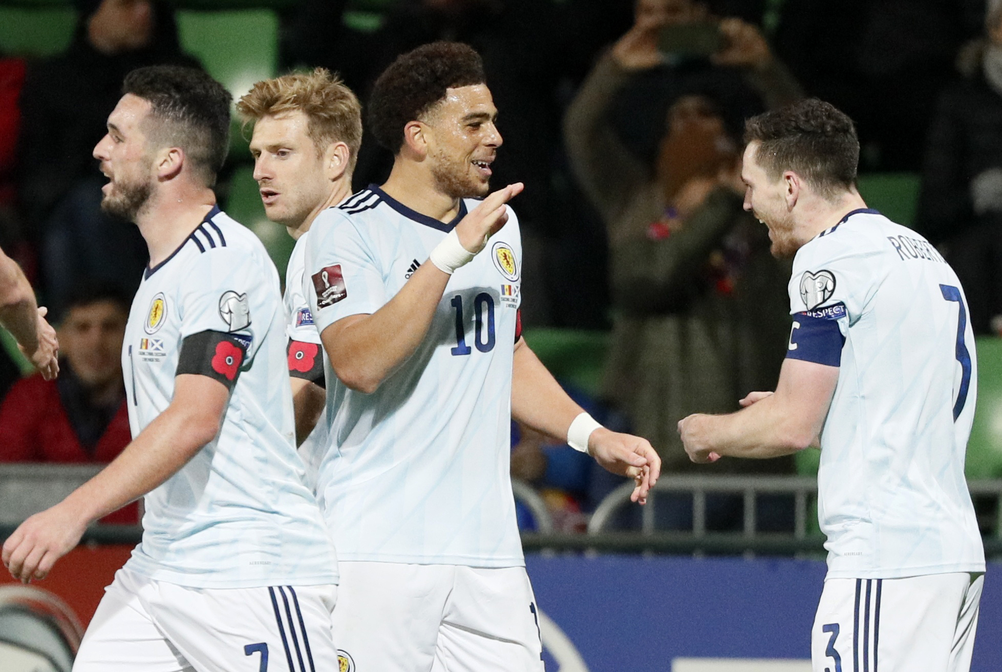 Soccer Football - World Cup - UEFA Qualifiers - Group F - Moldova v Scotland - Zimbru Stadium, Chisinau, Moldova - November 12, 2021 Scotland's Che Adams celebrates scoring their second goal with teammates REUTERS