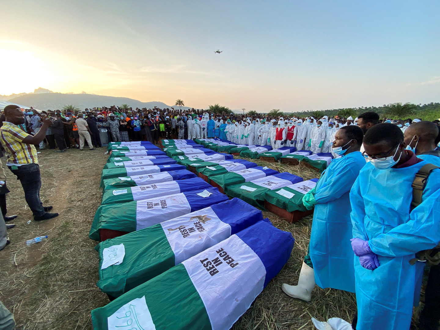 Coffins containing the remains of victims of the fuel tanker explosion are pictured during a burial ceremony at a cemetery in Freetown, Sierra Leone November 8, 2021. REUTERS