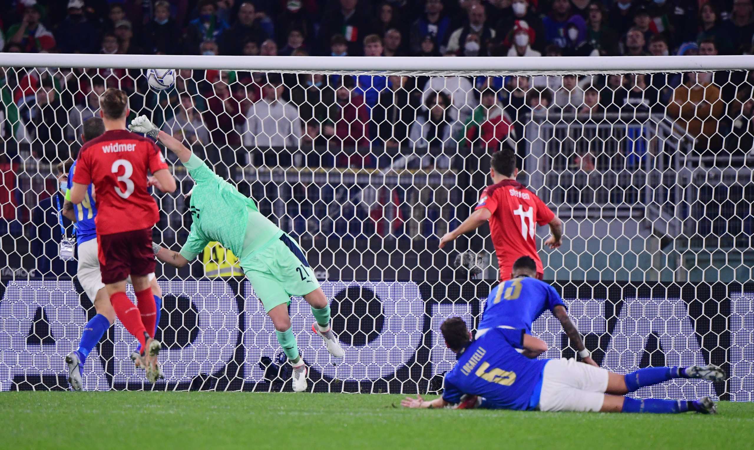 Soccer Football - World Cup - UEFA Qualifiers - Group C - Italy v Switzerland - Stadio Olimpico, Rome, Italy - November 12, 2021 Switzerland's Silvan Widmer scores their first goal REUTERS