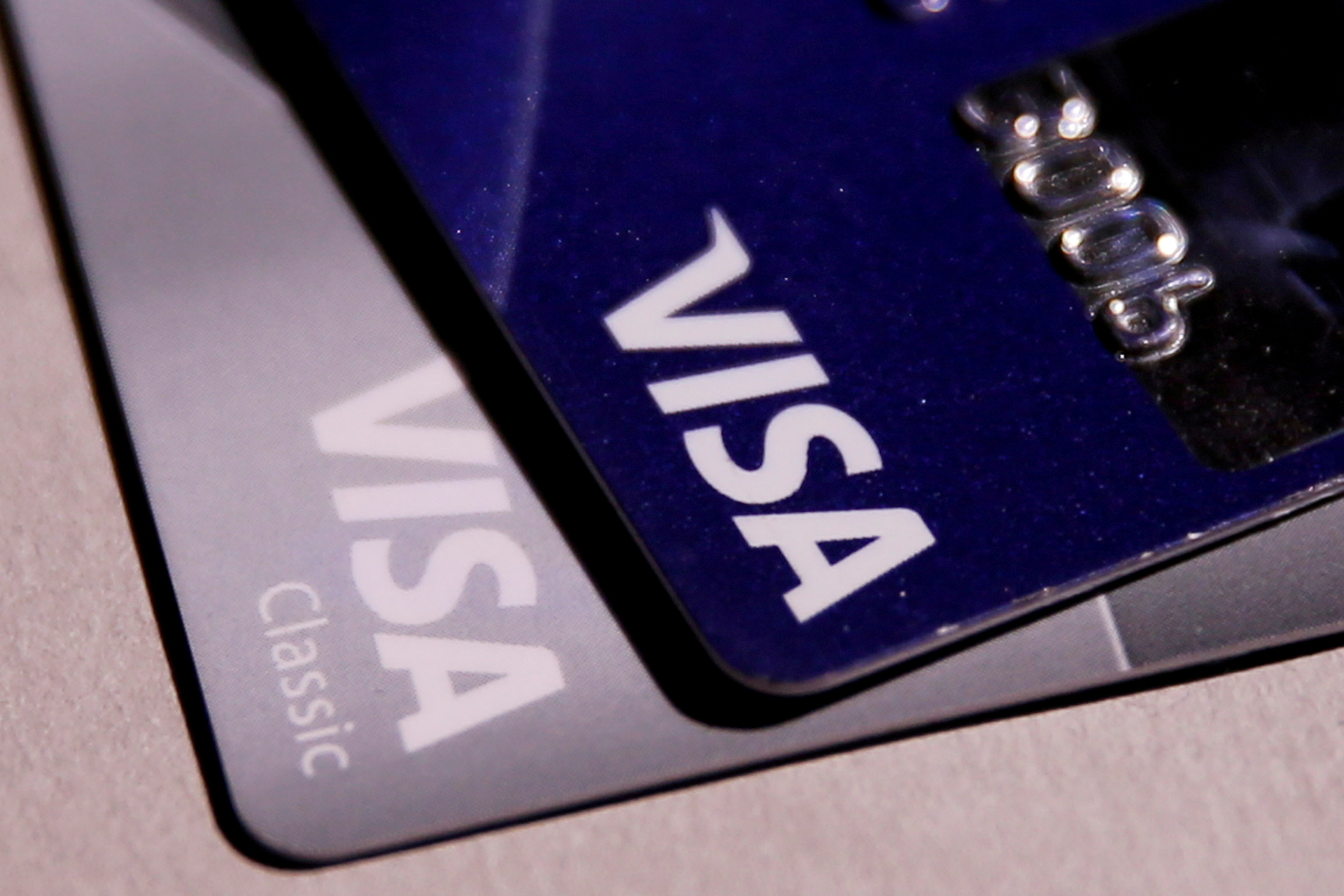 FILE PHOTO: Visa credit cards are seen in this picture illustration taken June 9, 2016. REUTERS
