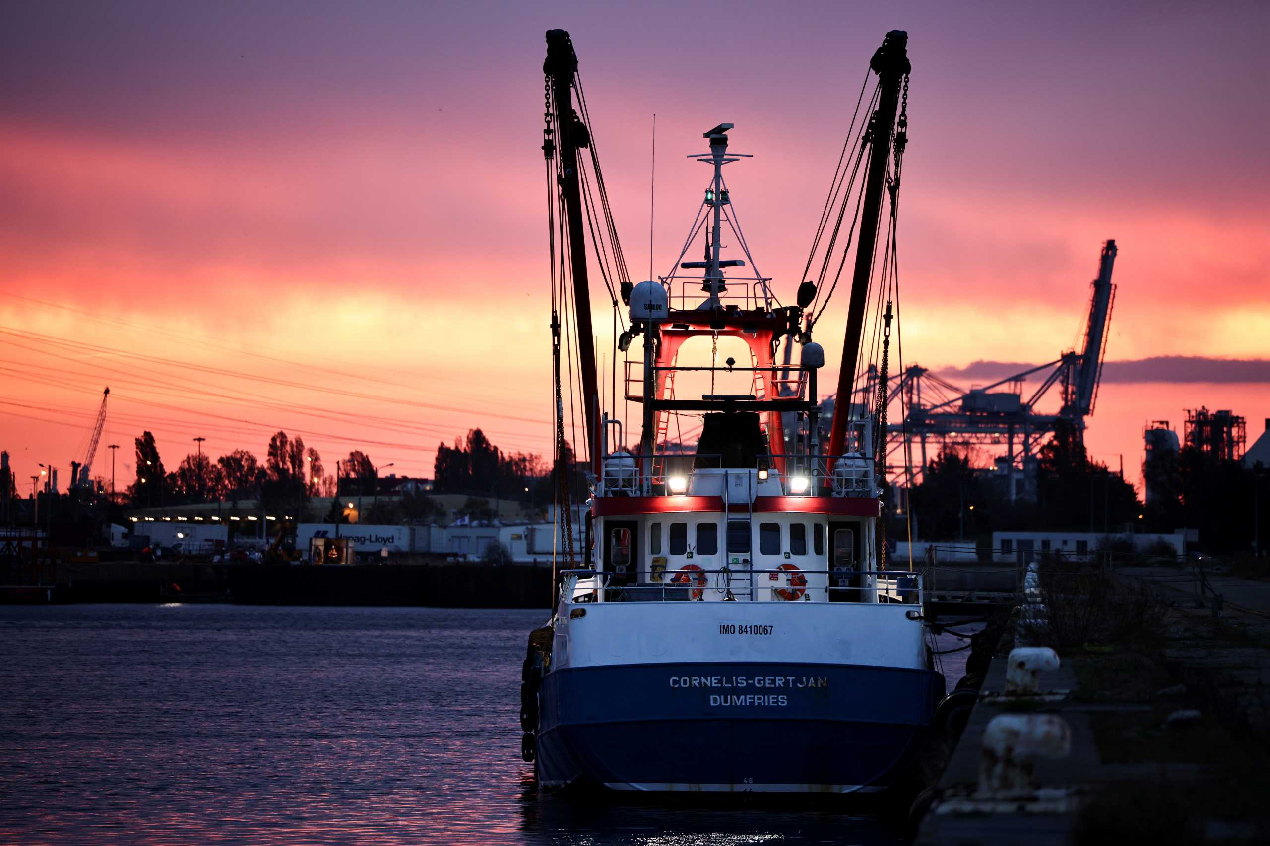 FILE PHOTO: A British trawler Cornelis Gert Jan is seen moored in the port of Le Havre, after France seized on Thursday a British trawler fishing in its territorial waters without a licence, in Le Havre, France, October 29, 2021. REUTERS