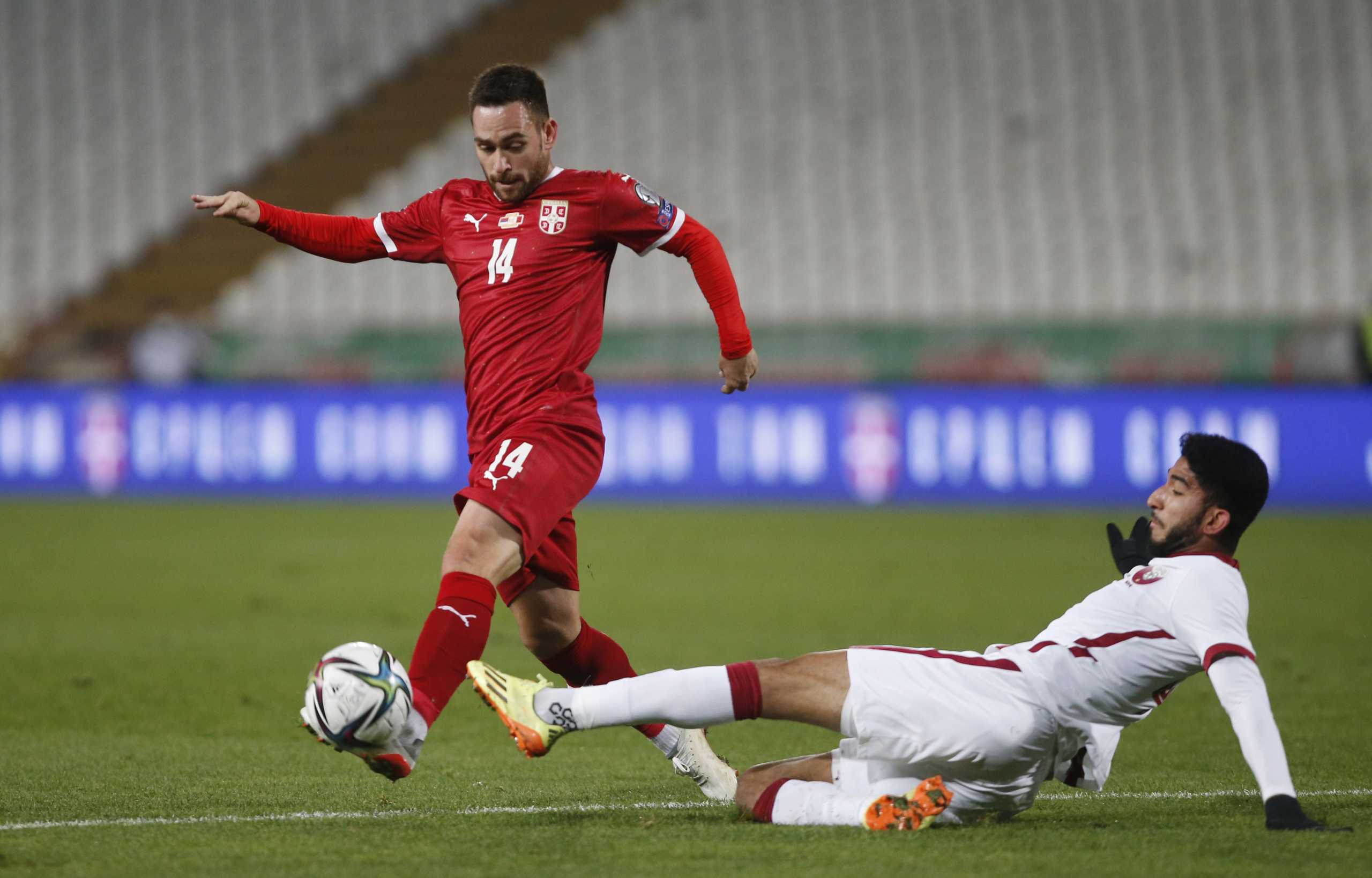 Soccer Football - International Friendly - Serbia v Qatar - Rajko Mitic Stadium, Belgrade, Serbia - November 11, 2021 Serbia's Andrija Zivkovic in action with Qatar's Mohammed Al Bayati REUTERS