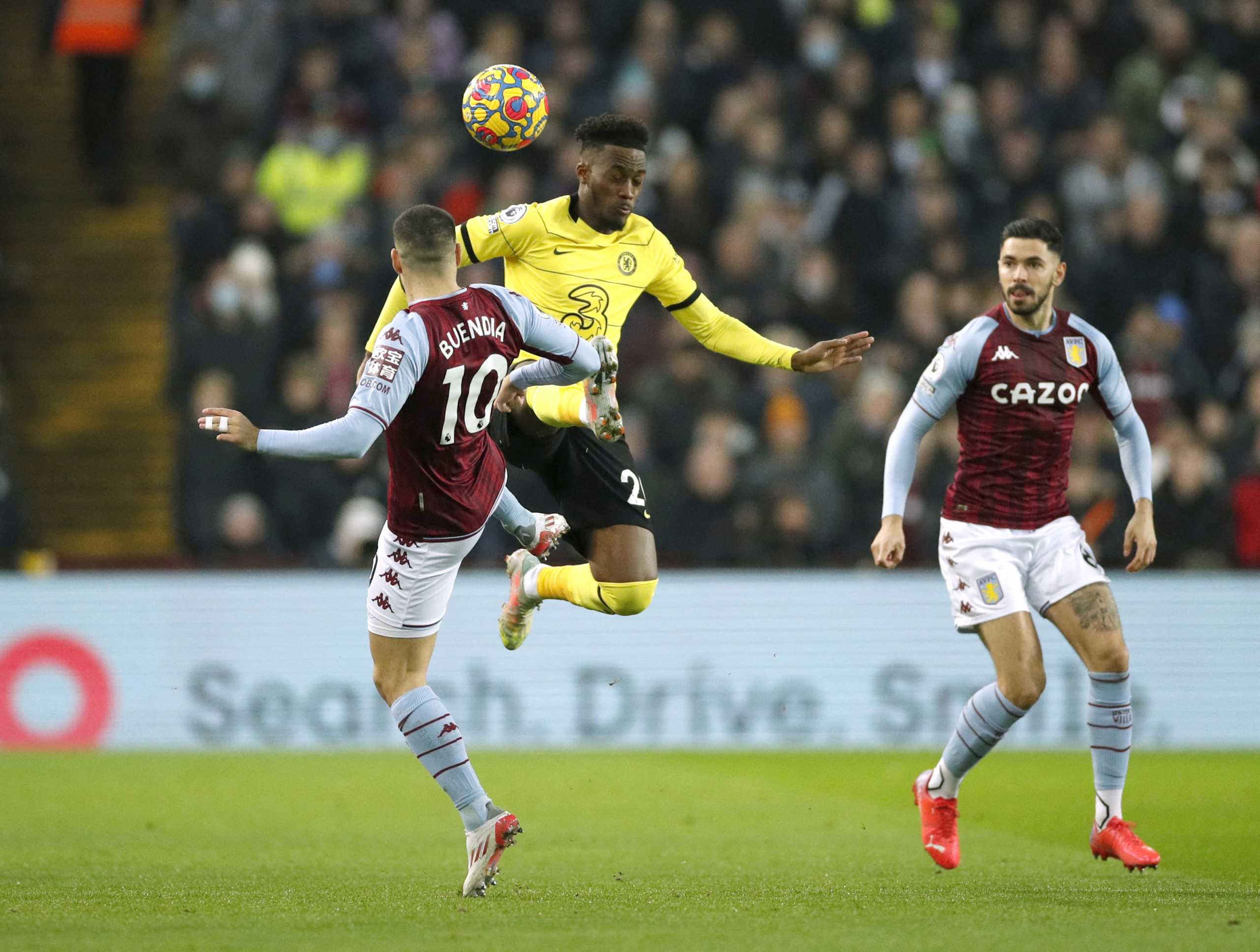 Soccer Football - Premier League - Aston Villa v Chelsea - Villa Park, Birmingham, Britain - December 26, 2021 Aston Villa's Emiliano Buendia in action with Chelsea's Callum Hudson-Odoi Action Images via Reuters