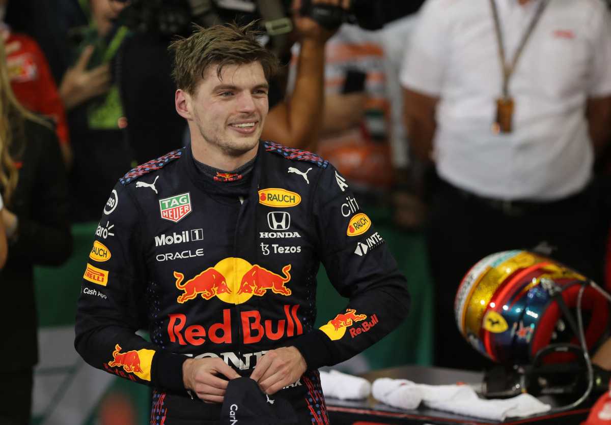 Formula One F1 - Abu Dhabi Grand Prix - Yas Marina Circuit, Abu Dhabi, United Arab Emirates - December 12, 2021 Red Bull's Max Verstappen celebrates winning the race and the world championship Pool via REUTERS