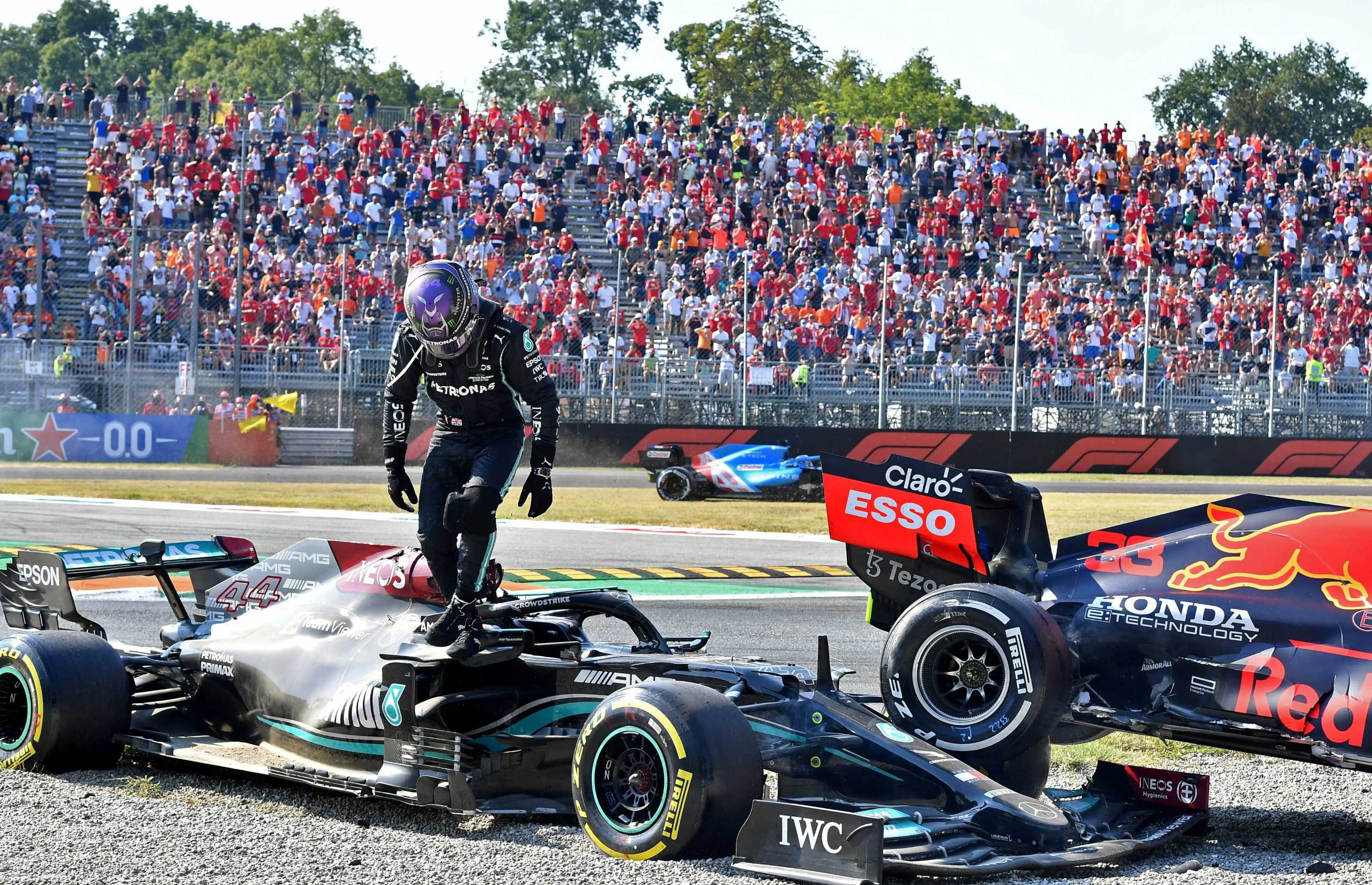 FILE PHOTO: Formula One F1 - Italian Grand Prix - Autodromo Nazionale Monza, Monza, Italy - September 12, 2021 Mercedes' Lewis Hamilton after crashing out of the race with Red Bull's Max Verstappen REUTERS