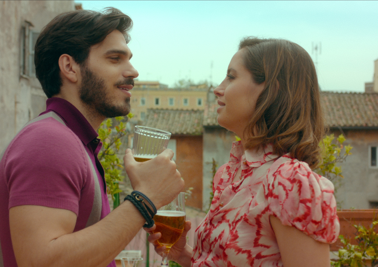 Four to Dinner. (L to R) Giuseppe Maggio as Dario and Matilde Gioli as Giulia in Four to Dinner. Cr. NETFLIX © 2021