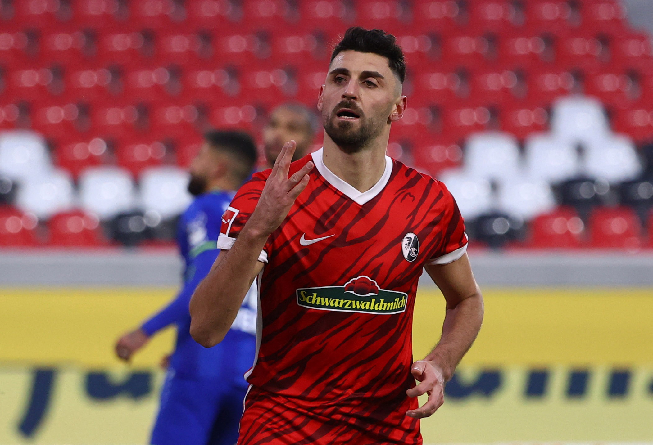 Soccer Football - Bundesliga - SC Freiburg v Bayer Leverkusen - Europa Park Stadion, Freiburg, Germany - December 19, 2021  SC Freiburg's Vincenzo Grifo celebrates scoring their first goal REUTERS