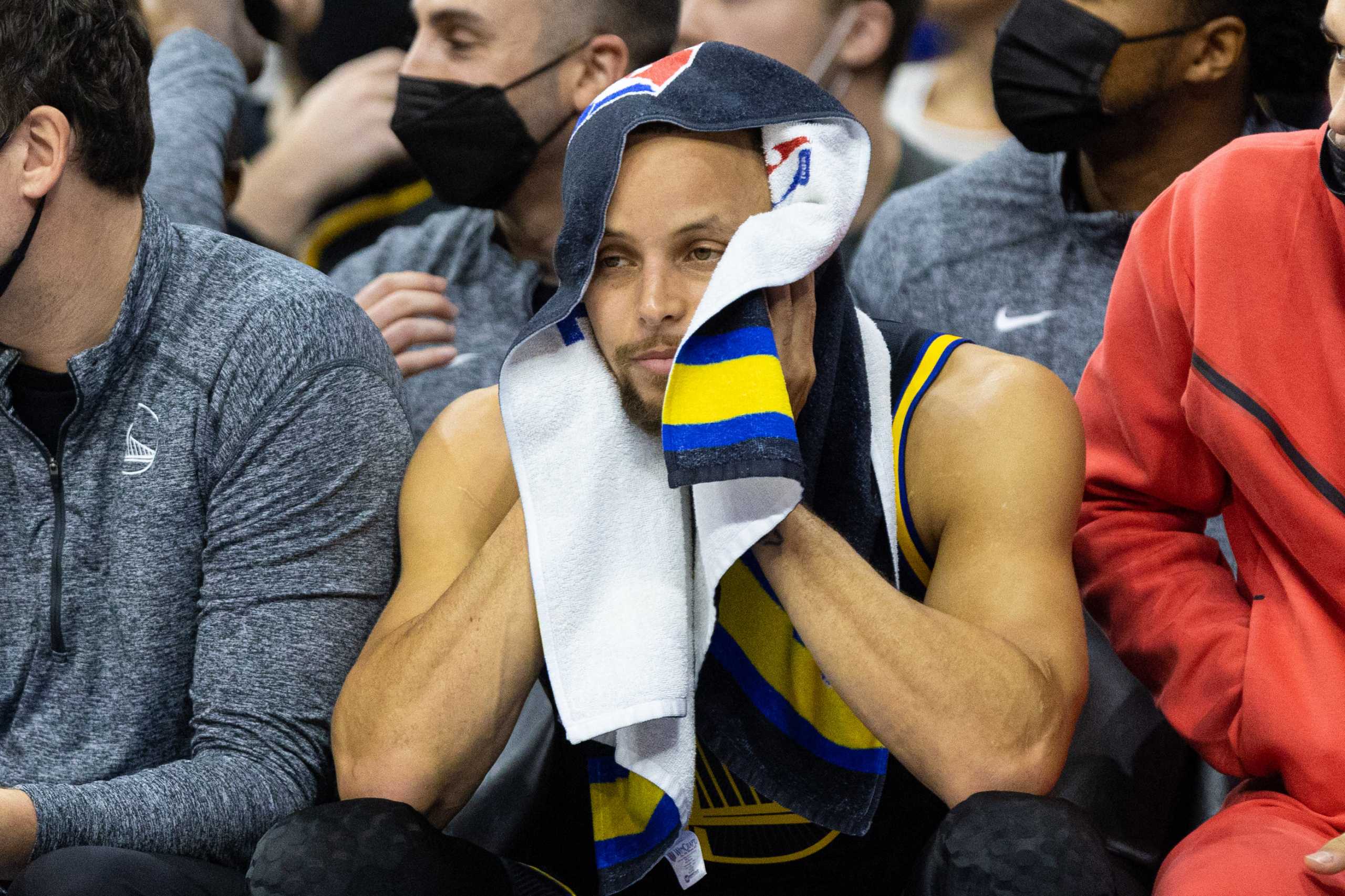 Dec 11, 2021; Philadelphia, Pennsylvania, USA; Golden State Warriors guard Stephen Curry (30) looks on from the bench during the third quarter against the Philadelphia 76ers at Wells Fargo Center. Mandatory Credit: Bill Streicher-USA TODAY Sports
