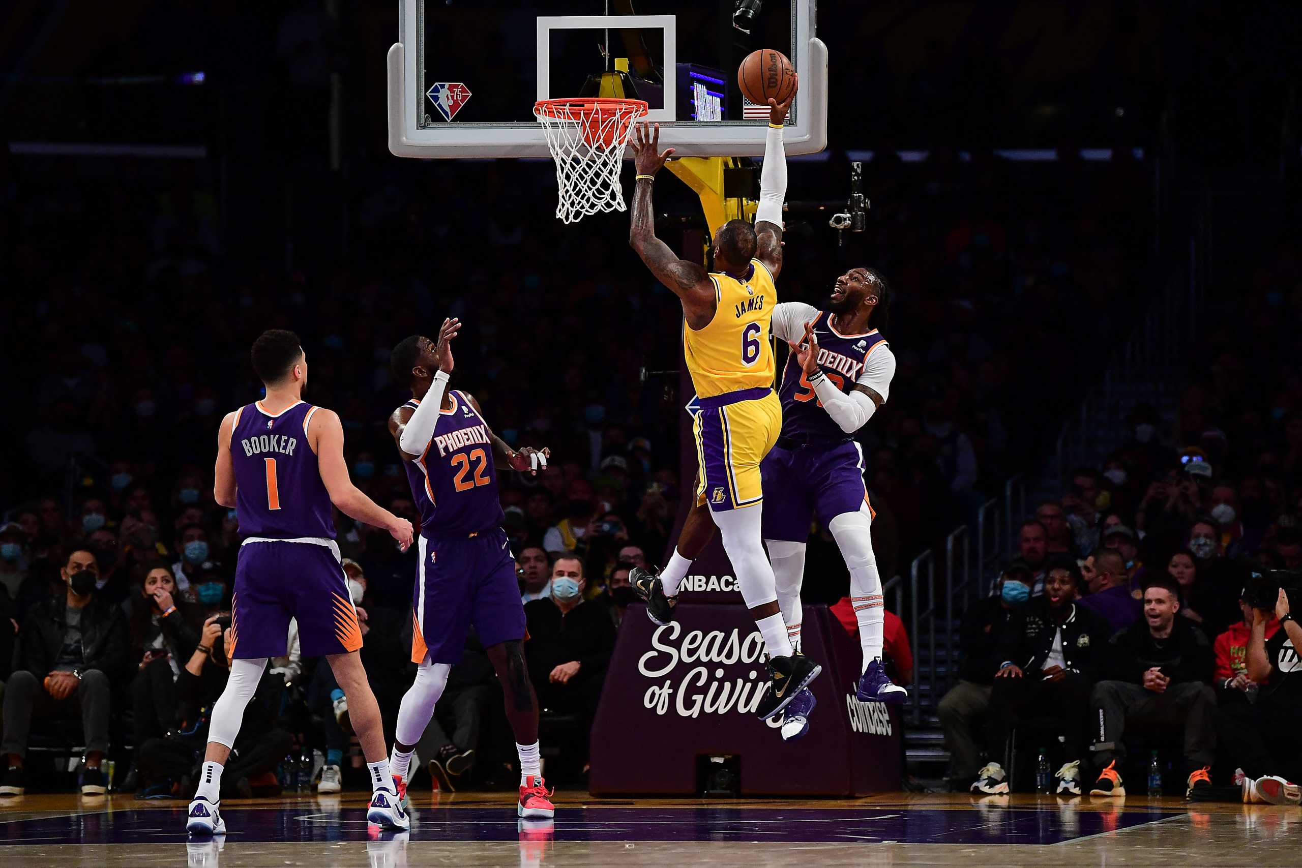 Dec 21, 2021; Los Angeles, California, USA; Los Angeles Lakers forward LeBron James (6) moves to the basket against Phoenix Suns forward Jae Crowder (99) during the second half at Staples Center. Mandatory Credit: Gary A. Vasquez-USA TODAY Sports