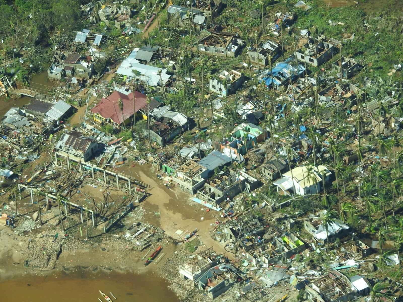 Aerial view showing damaged houses in Surigao City, Surigao Del Norte Province, Philippines, December 17, 2021. Picture taken December 17, 2021. Philippine Coast Guard