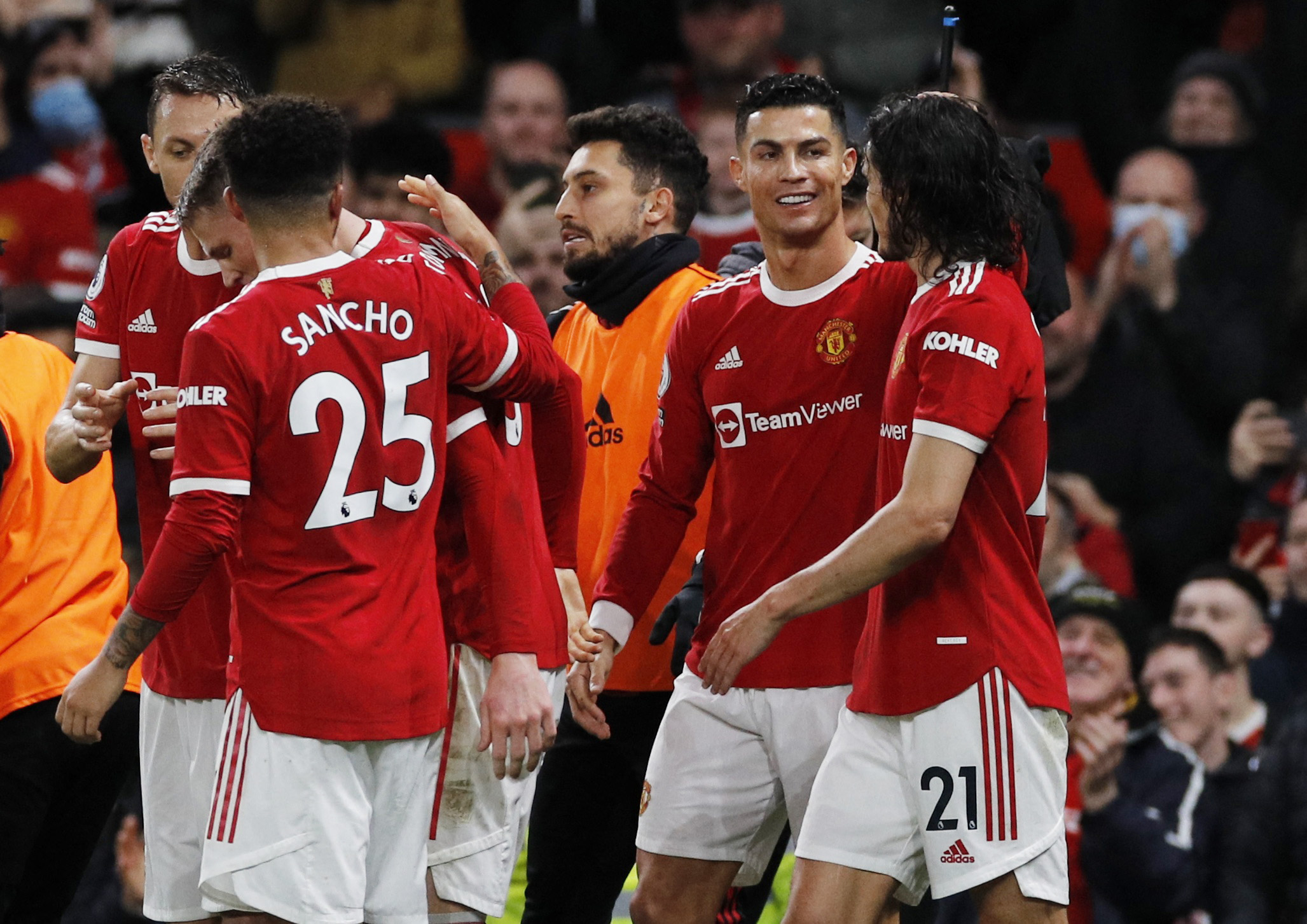 Soccer Football - Premier League - Manchester United v Burnley - Old Trafford, Manchester, Britain - December 30, 2021 Manchester United's Cristiano Ronaldo celebrates scoring their third goal with Edinson Cavani REUTERS