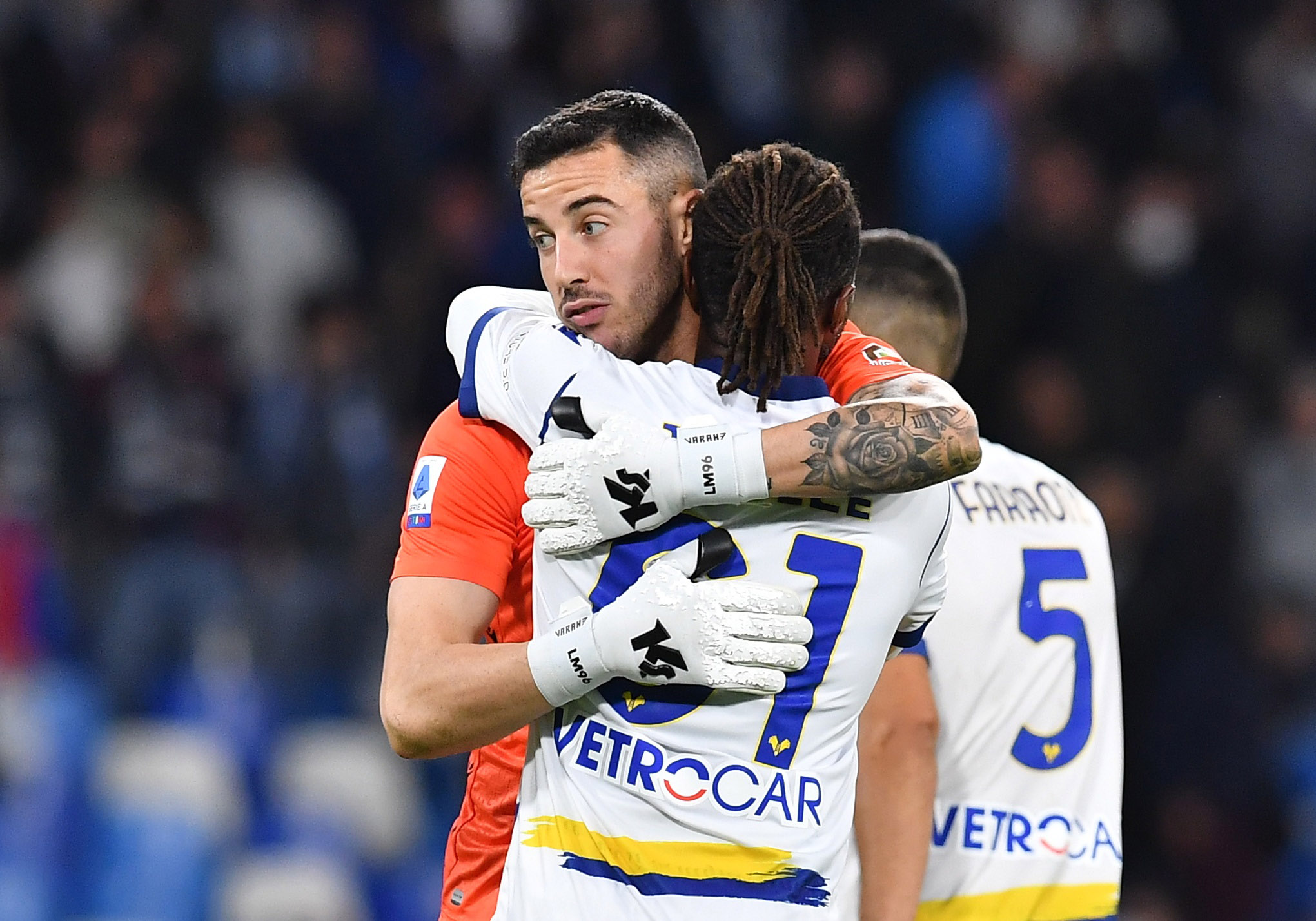 Soccer Football - Serie A - Napoli v Hellas Verona - Stadio Diego Armando Maradona, Naples, Italy - November 7, 2021 Hellas Verona's Adrien Tameze and Lorenzo Montipo hug after the match REUTERS