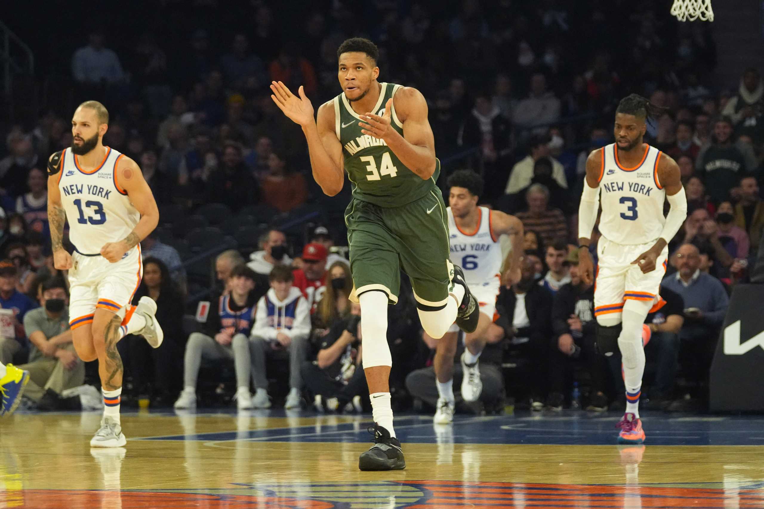 Dec 12, 2021; New York, New York, USA; Milwaukee Bucks power forward Giannis Antetokounmpo (34) reacts to making a dunk against the New York Knicks during the first half at Madison Square Garden. Mandatory Credit: Gregory Fisher-USA TODAY Sports