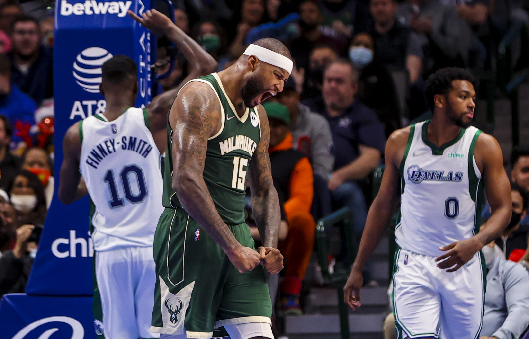 Dec 23, 2021; Dallas, Texas, USA;   Milwaukee Bucks center DeMarcus Cousins (15) reacts after scoring during the second half against the Dallas Mavericks at American Airlines Center. Mandatory Credit: Kevin Jairaj-USA TODAY Sports
