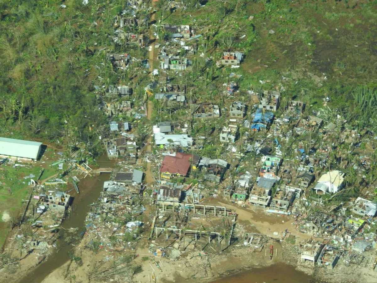 Aerial view showing damaged houses in Surigao City, Surigao Del Norte Province, Philippines, December 17, 2021. Picture taken December 17, 2021. Philippine Coast Guard