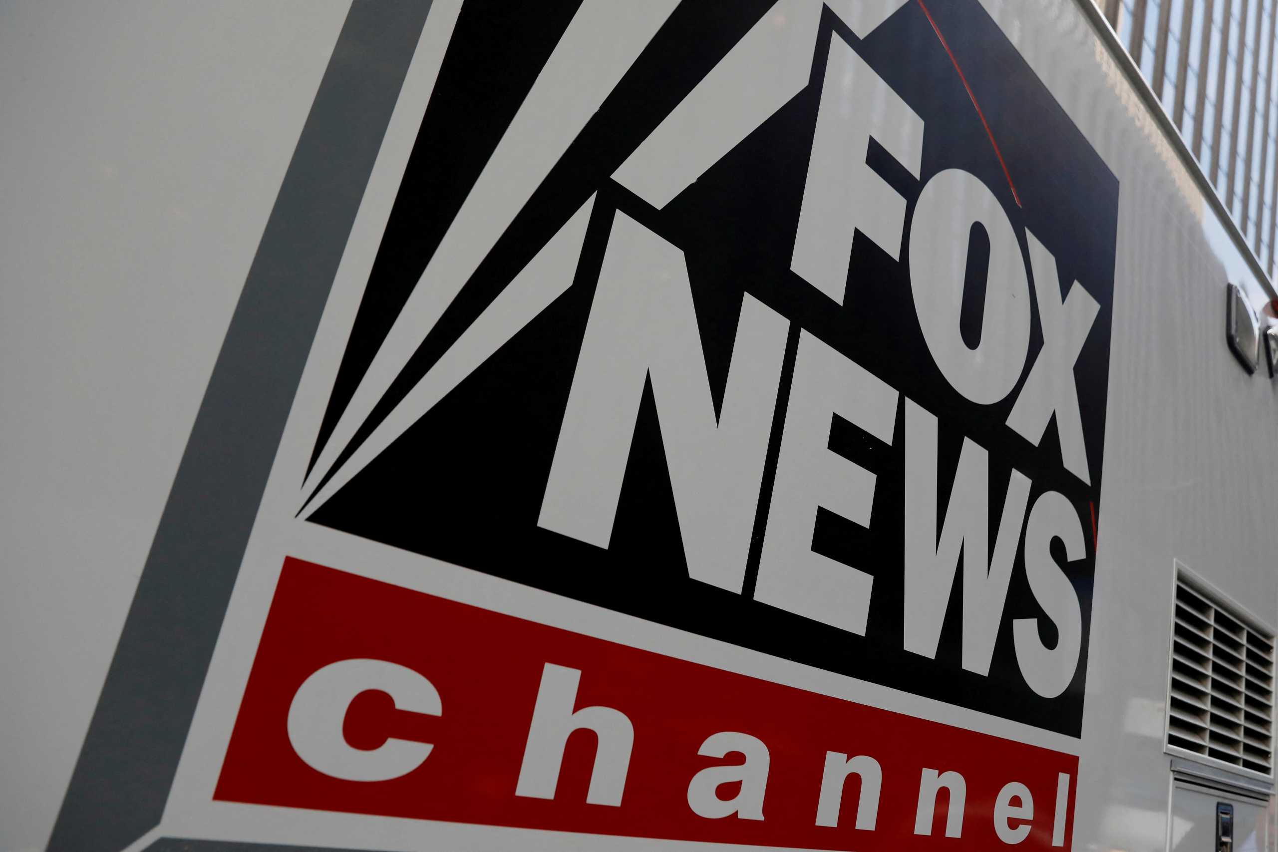 FILE PHOTO: A Fox News channel sign is seen on a television vehicle outside the News Corporation building in New York City, in New York, U.S. November 8, 2017. REUTERS