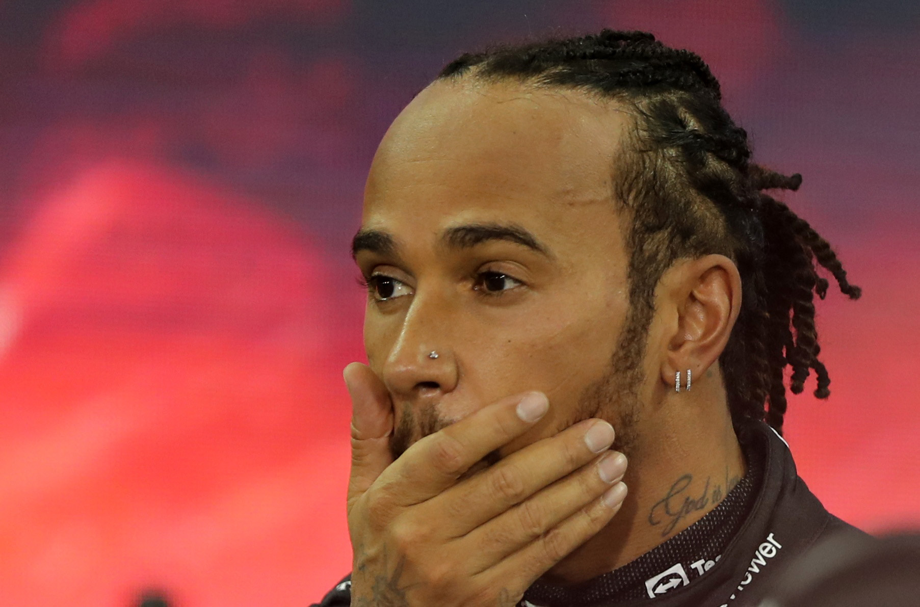 Formula One F1 - Abu Dhabi Grand Prix - Yas Marina Circuit, Abu Dhabi, United Arab Emirates - December 12, 2021 Mercedes' Lewis Hamilton looks dejected after finishing second in the race and the world championship Pool via REUTERS