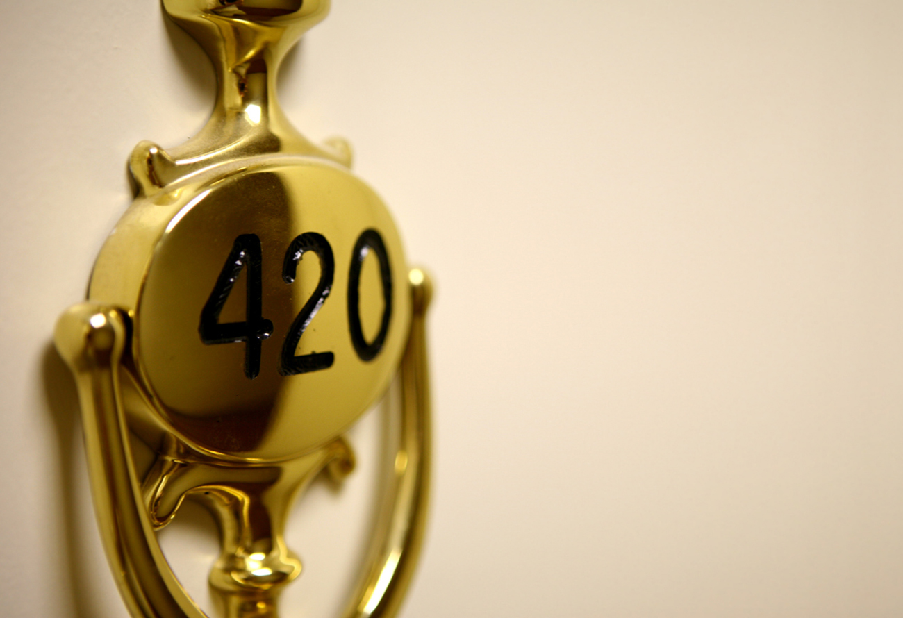 Room 420 door knocker, shallow focus.