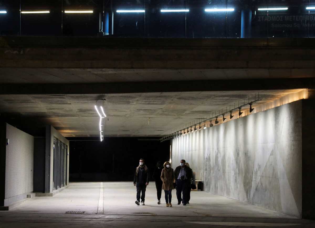 People wearing protective face masks walk on a road amid the coronavirus disease (COVID-19) outbreak in Nicosia, Cyprus December 29, 2021. REUTERS