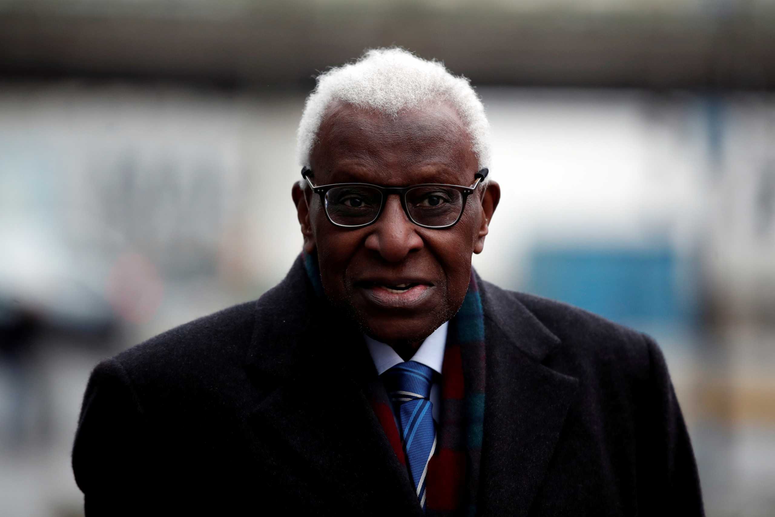 FILE PHOTO: Former President of International Association of Athletics Federations (IAAF) Lamine Diack arrives for his trial at the Paris courthouse, France, January 13, 2020. REUTERS