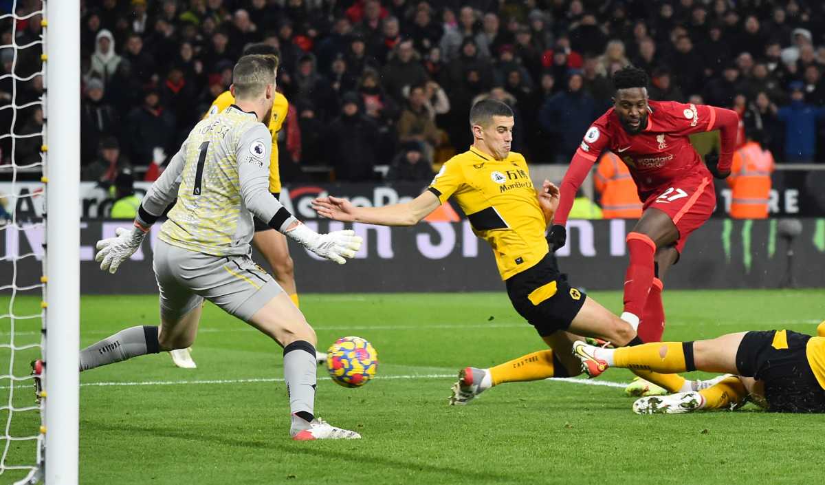 Soccer Football - Premier League - Wolverhampton Wanderers v Liverpool - Molineux Stadium, Wolverhampton, Britain - December 4, 2021  Liverpool's Divock Origi scores their first goal REUTERS