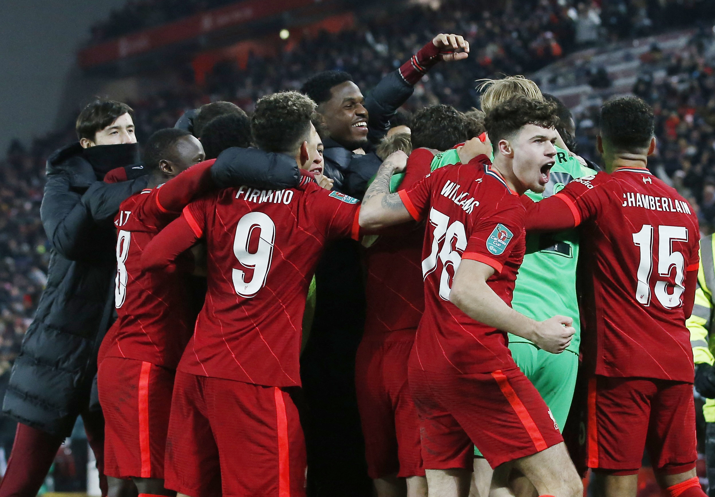 Soccer Football - Carabao Cup - Quarter Final - Liverpool v Leicester City - Anfield, Liverpool, Britain - December 22, 2021 Liverpool players celebrate winning the penalty shoot-out REUTERS