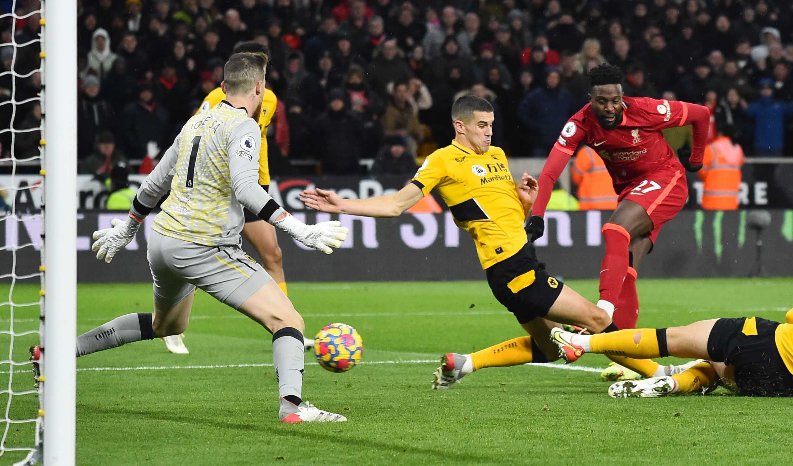 Soccer Football - Premier League - Wolverhampton Wanderers v Liverpool - Molineux Stadium, Wolverhampton, Britain - December 4, 2021  Liverpool's Divock Origi scores their first goal REUTERS