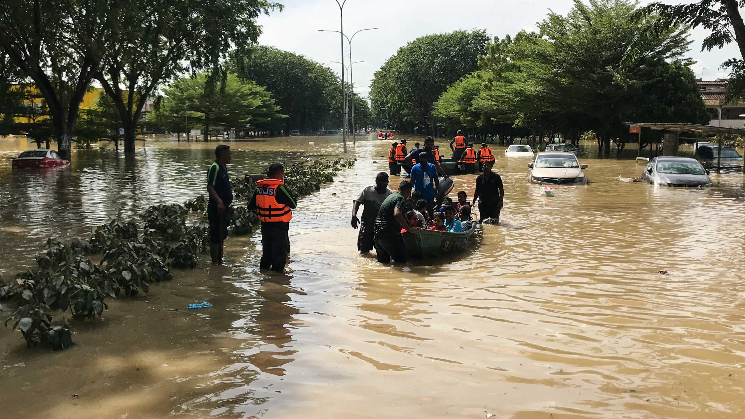 Search and rescue team evacuates flood victims in Shah Alam, Selangor state, Malaysia, December 20, 2021. REUTERS