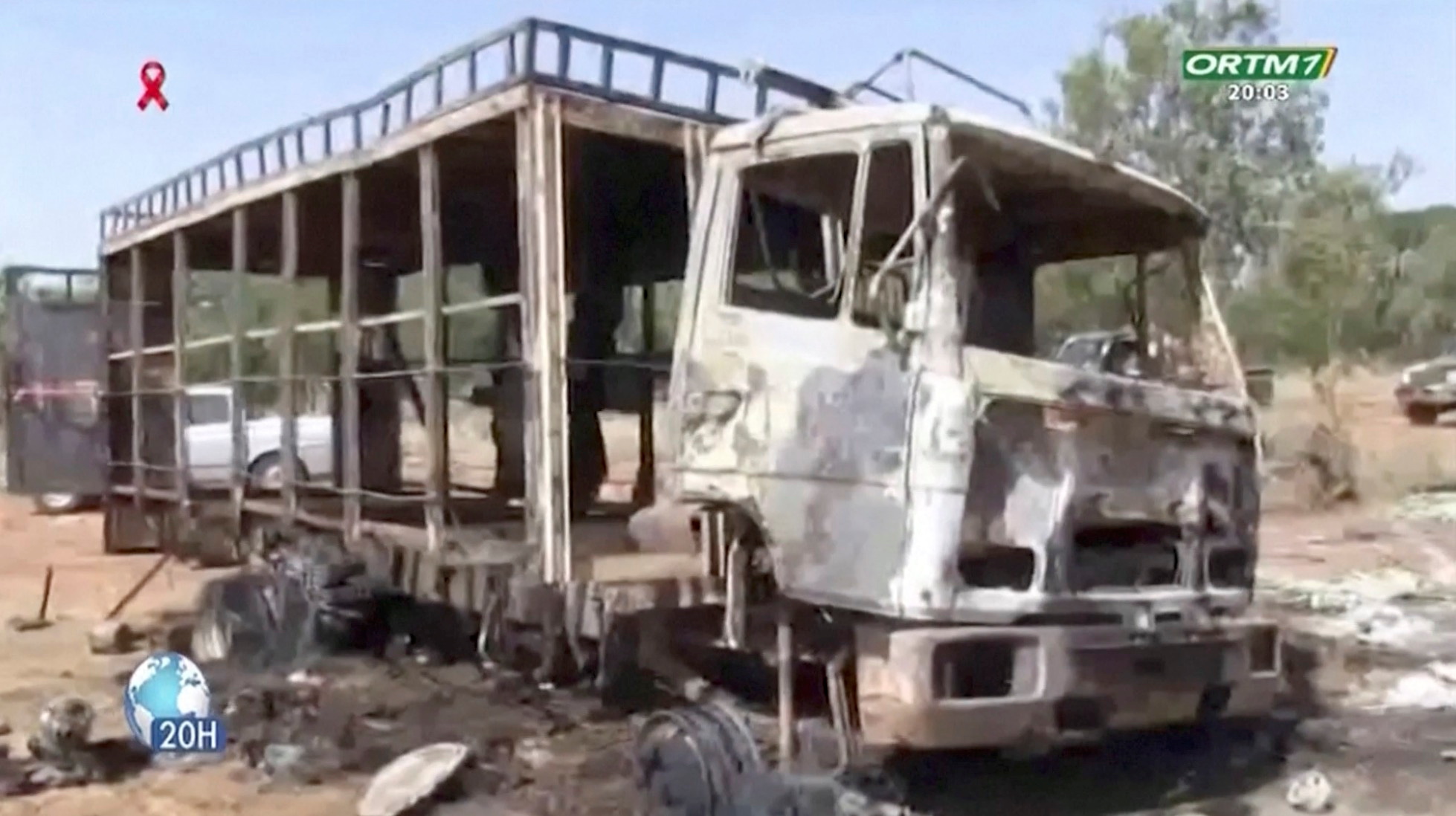 A burnt bus is seen following a gunmen attack near Bankass, Mali December 4, 2021 in this still image obtained from a video taken December 4, 2021. ORTM
