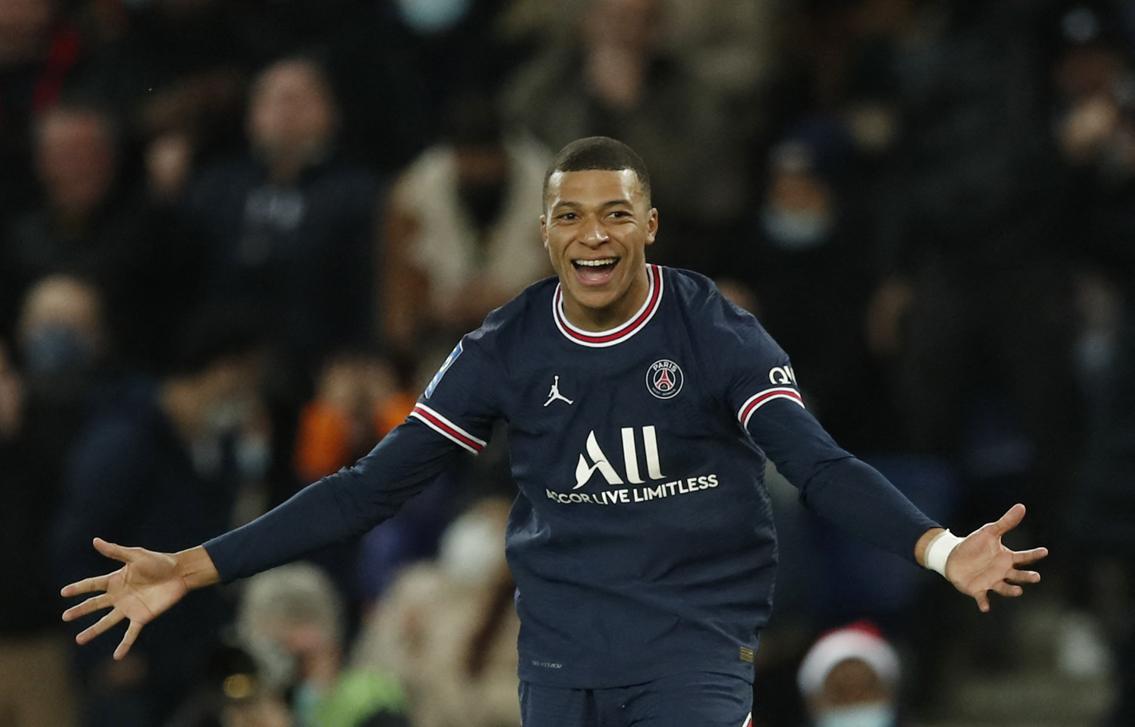 Soccer Football - Ligue 1 - Paris St Germain v AS Monaco - Parc des Princes, Paris, France - December 12, 2021 Paris St Germain's Kylian Mbappe celebrates scoring their second goal REUTERS