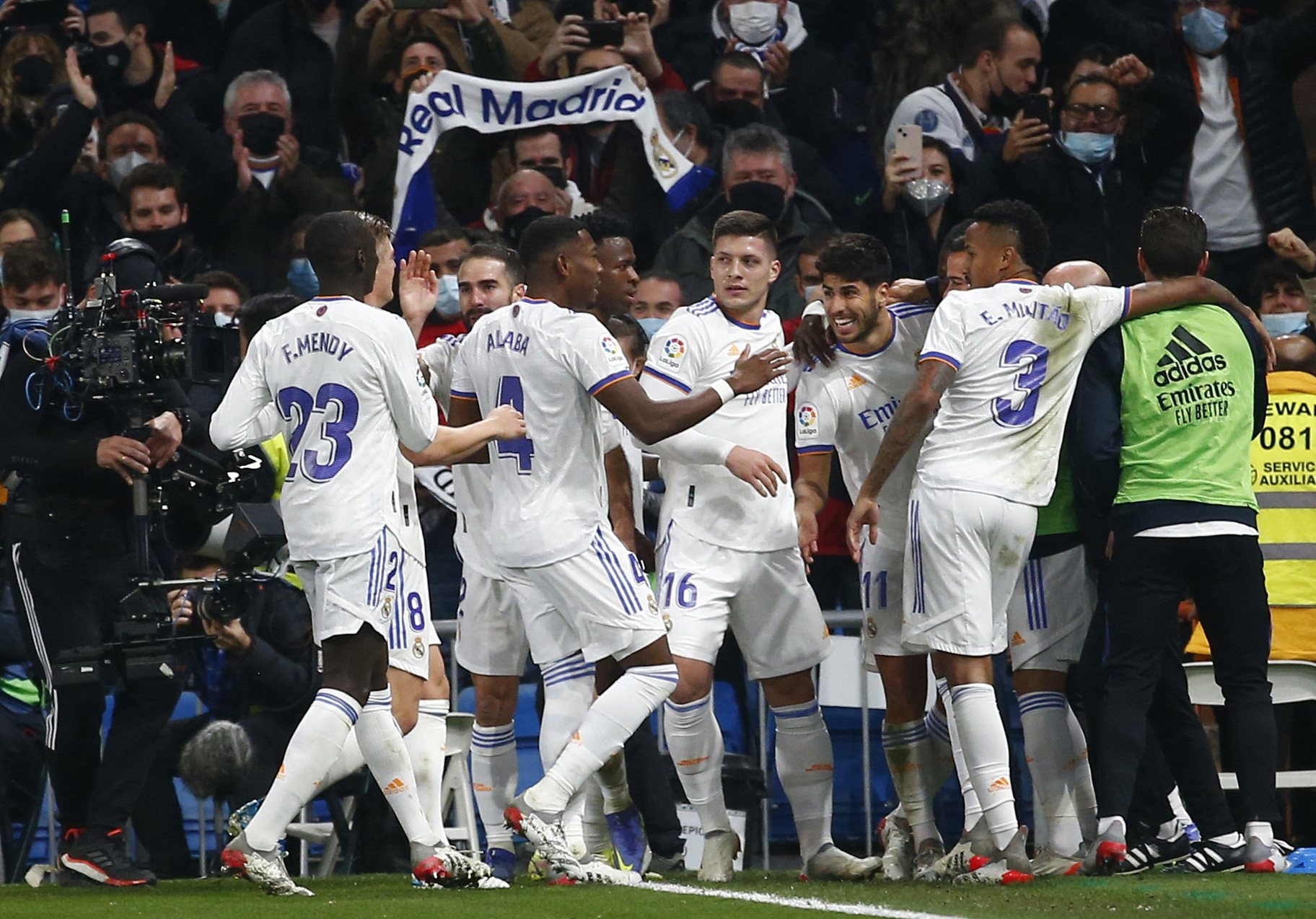 Soccer Football - LaLiga - Real Madrid v Atletico Madrid - Santiago Bernabeu, Madrid, Spain - December 12, 2021 Real Madrid's Marco Asensio celebrates scoring their second goal with teammates REUTERS