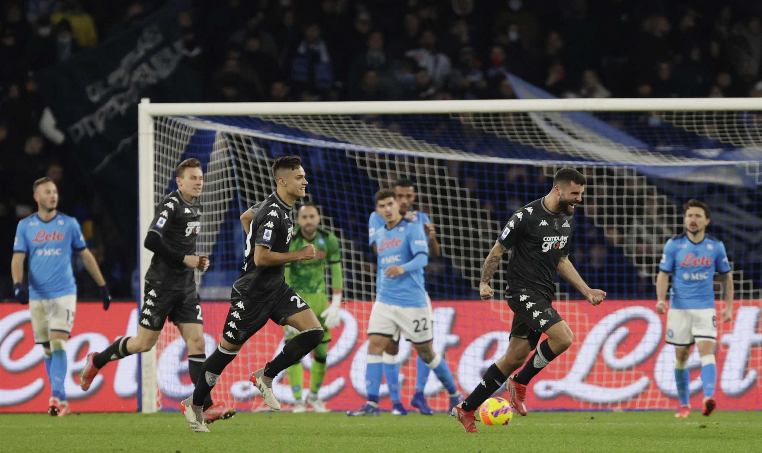 Soccer Football - Serie A - Napoli v Empoli - Stadio Diego Armando Maradona, Naples, Italy - December 12, 2021 Empoli's Patrick Cutrone celebrates scoring their first goal with teammates REUTERS
