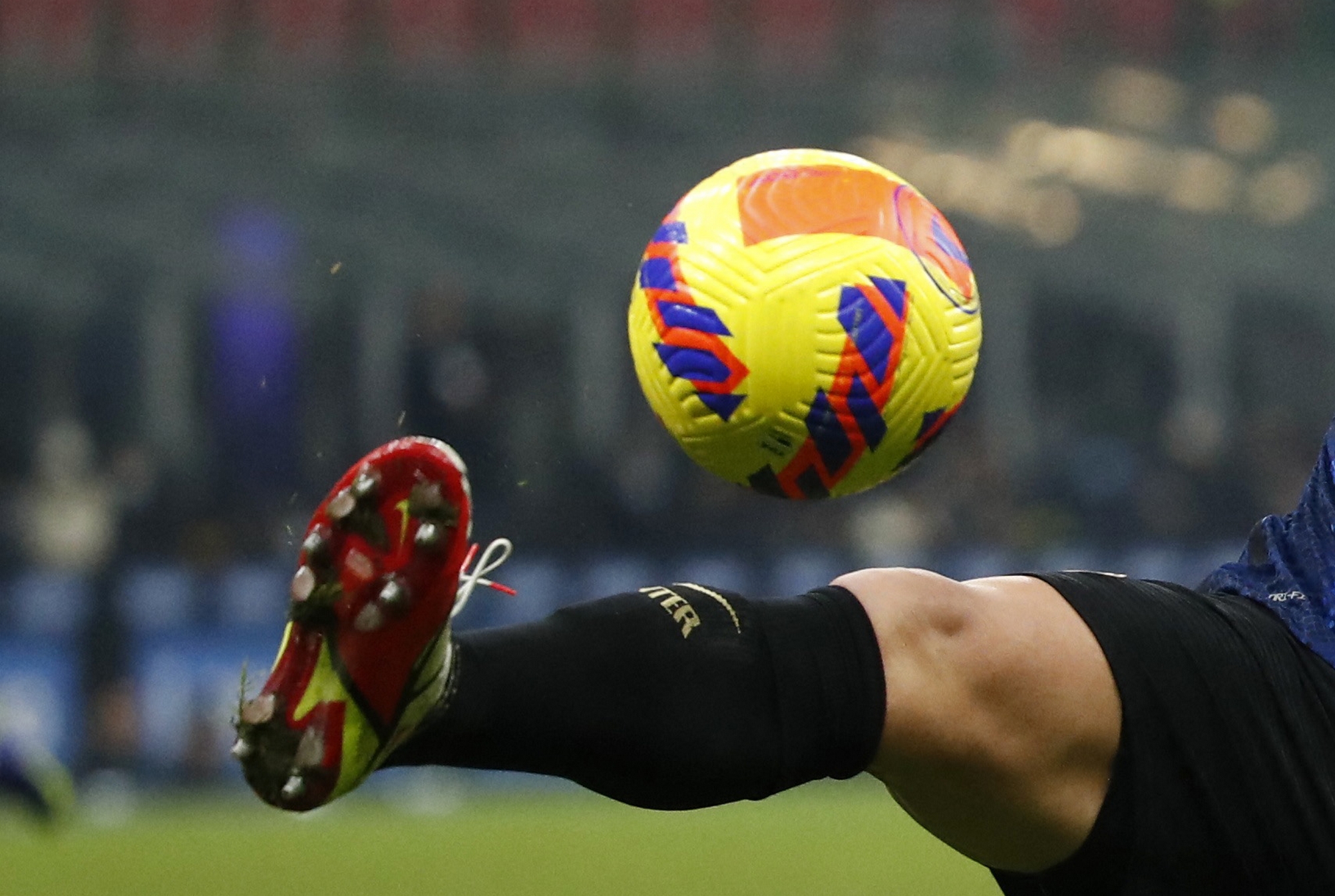 Soccer Football - Serie A - Inter Milan v Cagliari - San Siro, Milan, Italy - December 12, 2021 Inter Milan's Lautaro Martinez in action with Cagliari's Razvan Marin REUTERS