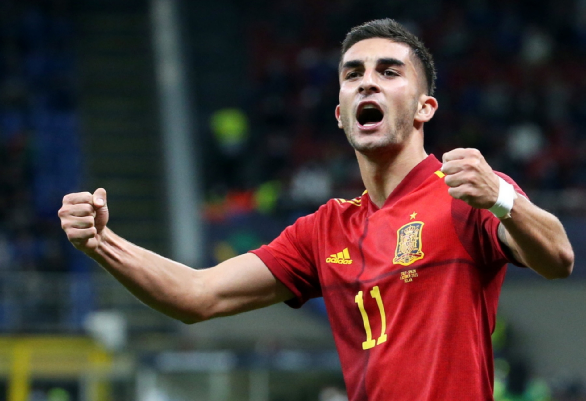 epa09509728 Ferran Torres of Spain celebrates after scoring the opening goal during the UEFA Nations League semi final soccer match between Italy and Spain in Milan, Italy, 06 October 2021.  EPA