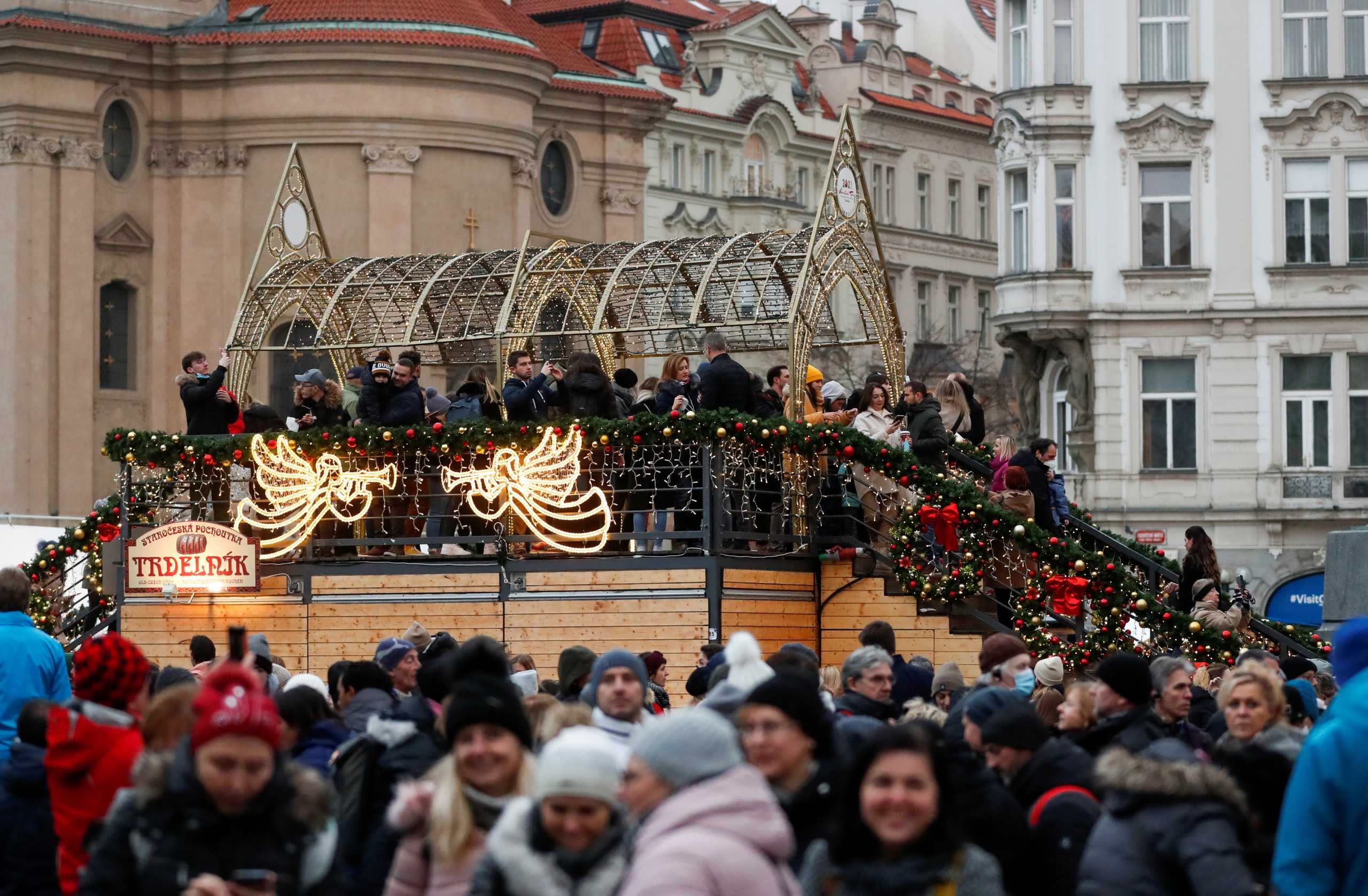 People visit the traditional Christmas market at the Old Town Square despite of its cancellation due to COVID-19 concerns, in Prague, Czech Republic, November 27, 2021. REUTERS